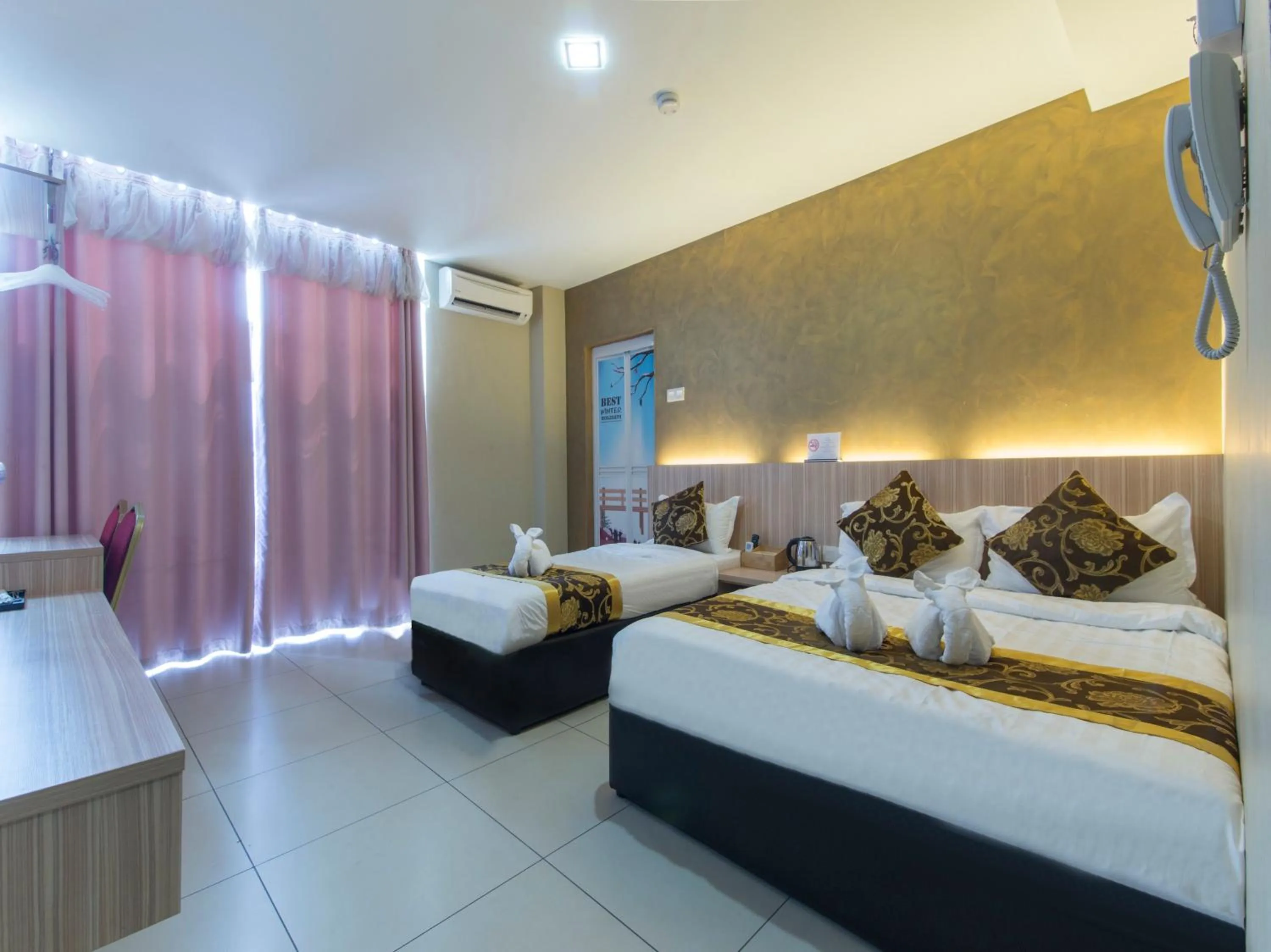 Bed in Top Garden Hotel