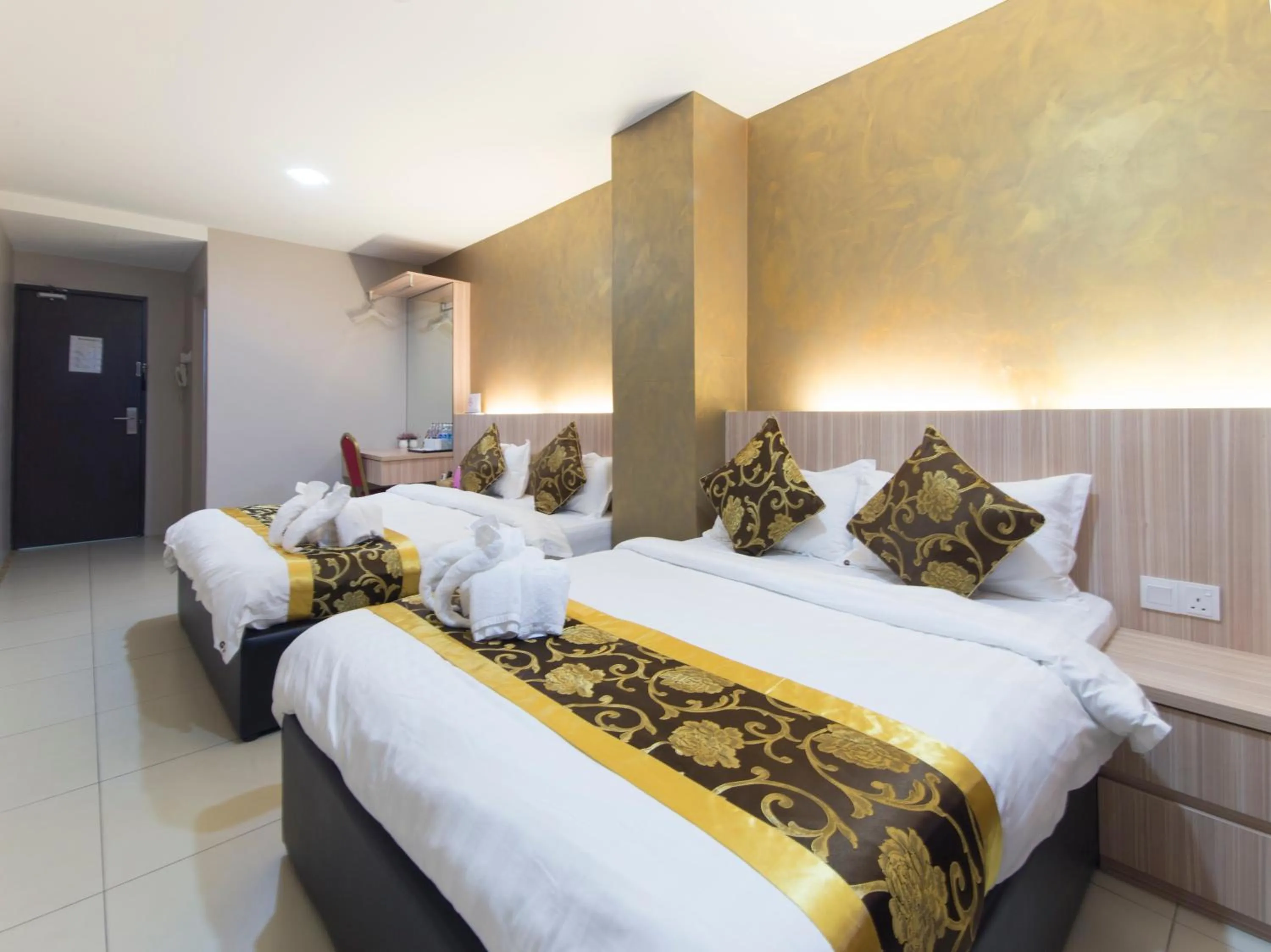 Bed in Top Garden Hotel