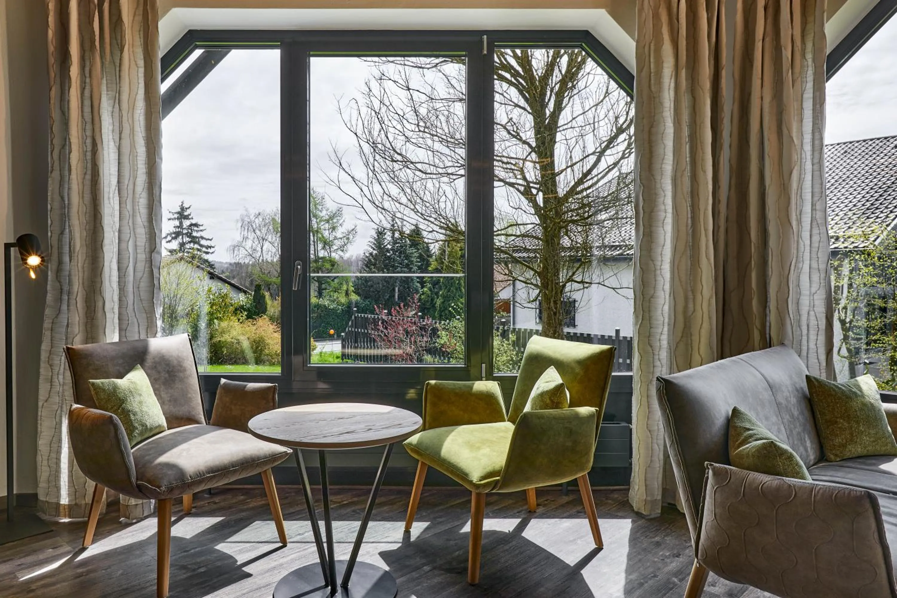 Communal lounge/ TV room in Hotel Lindenhof