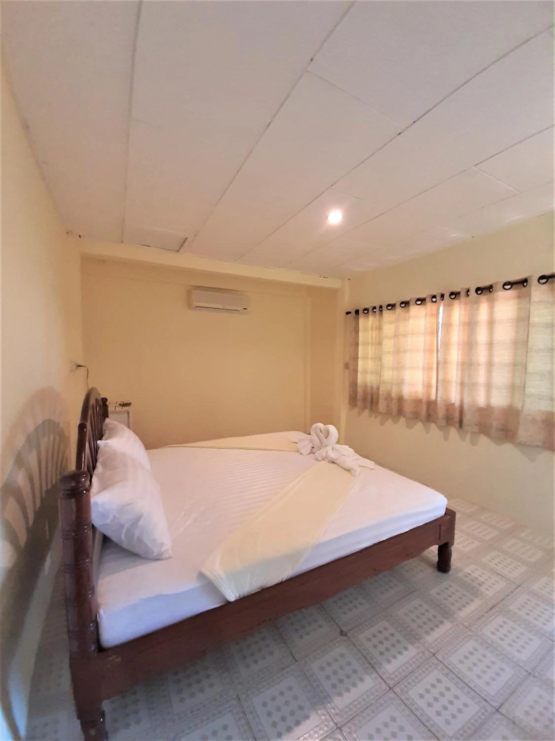 Bed in Cameron Island Resort