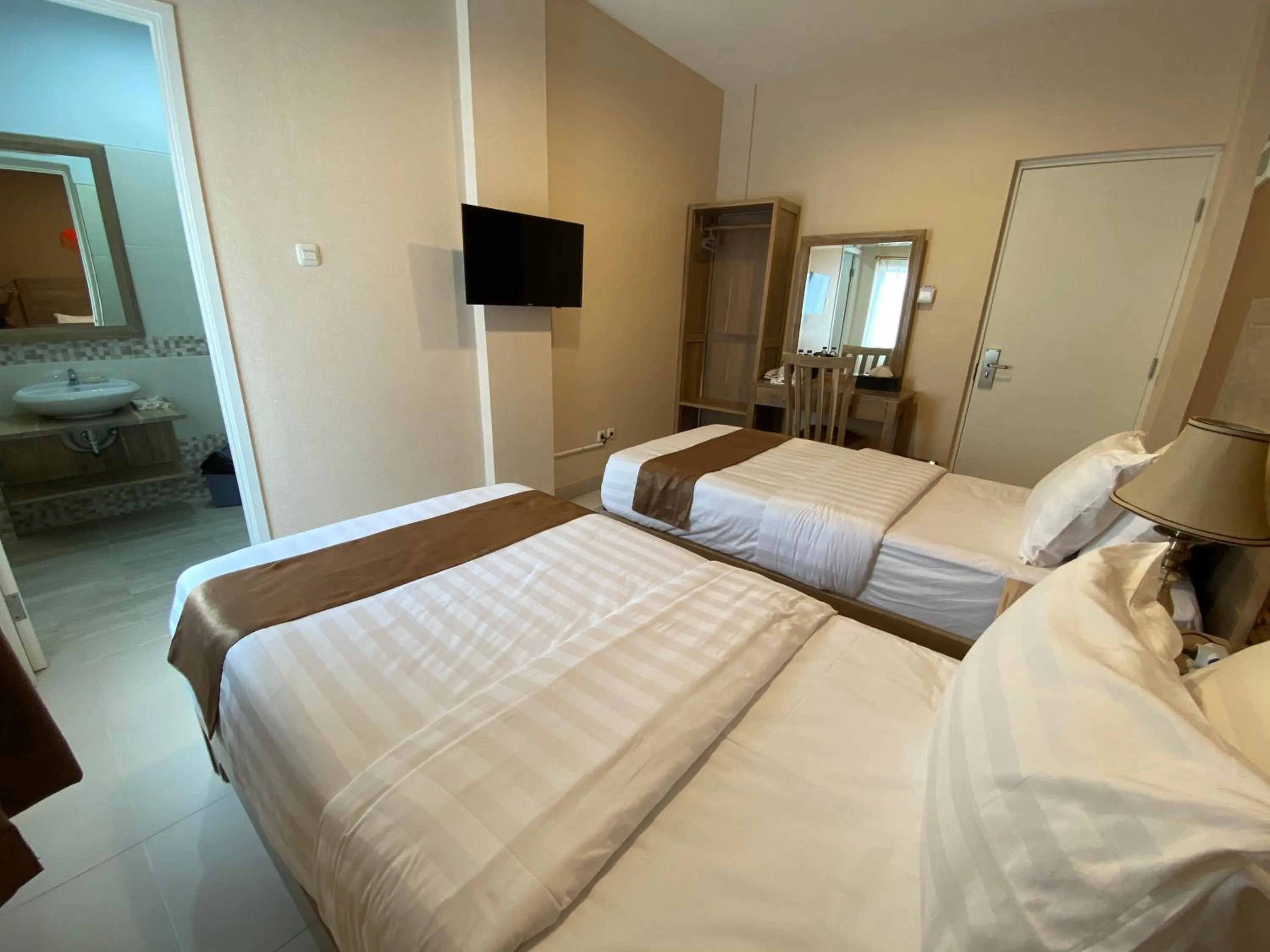 Bed in Flamingo Avia Labuan Bajo