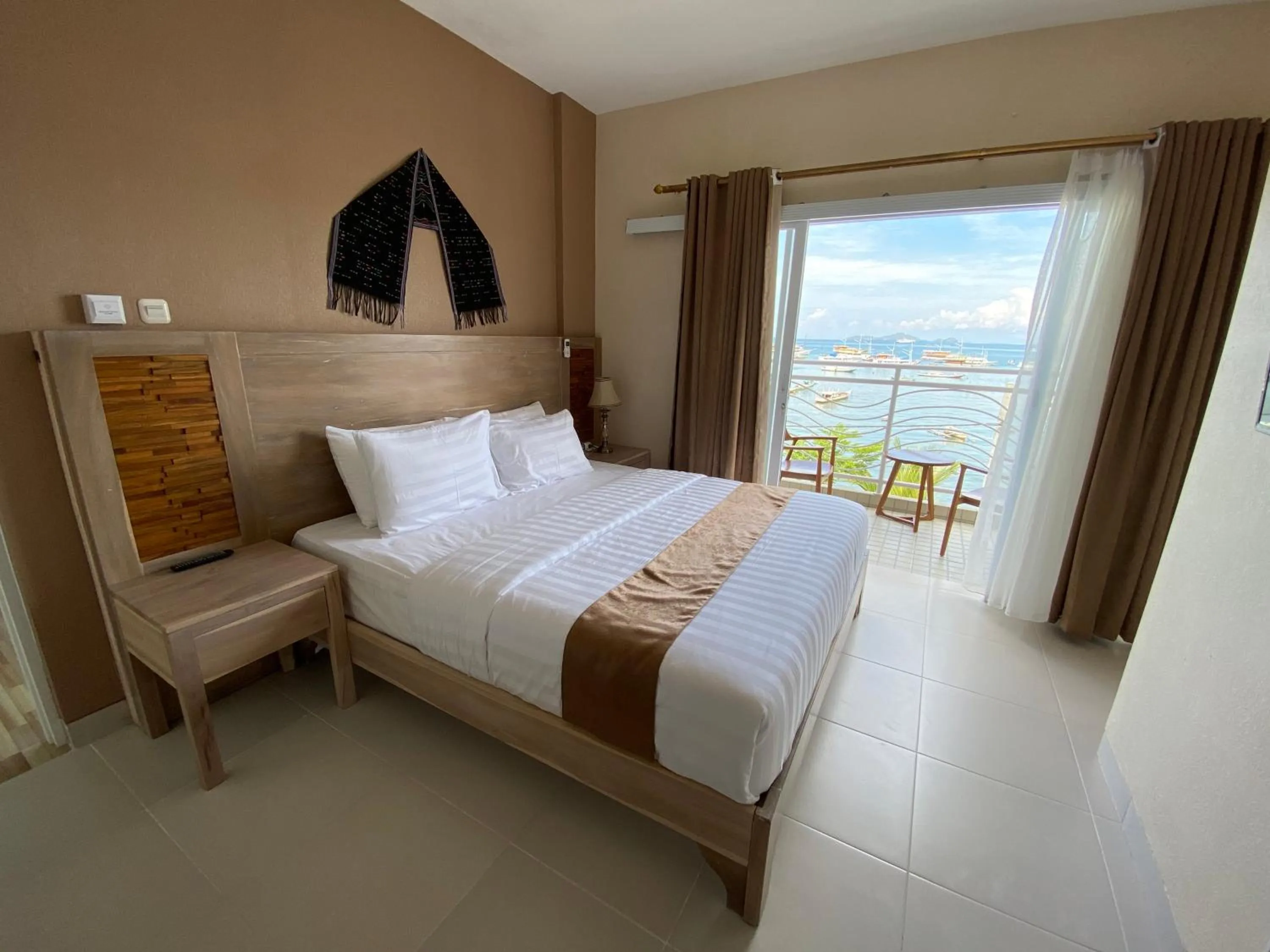 Bed in Flamingo Avia Labuan Bajo