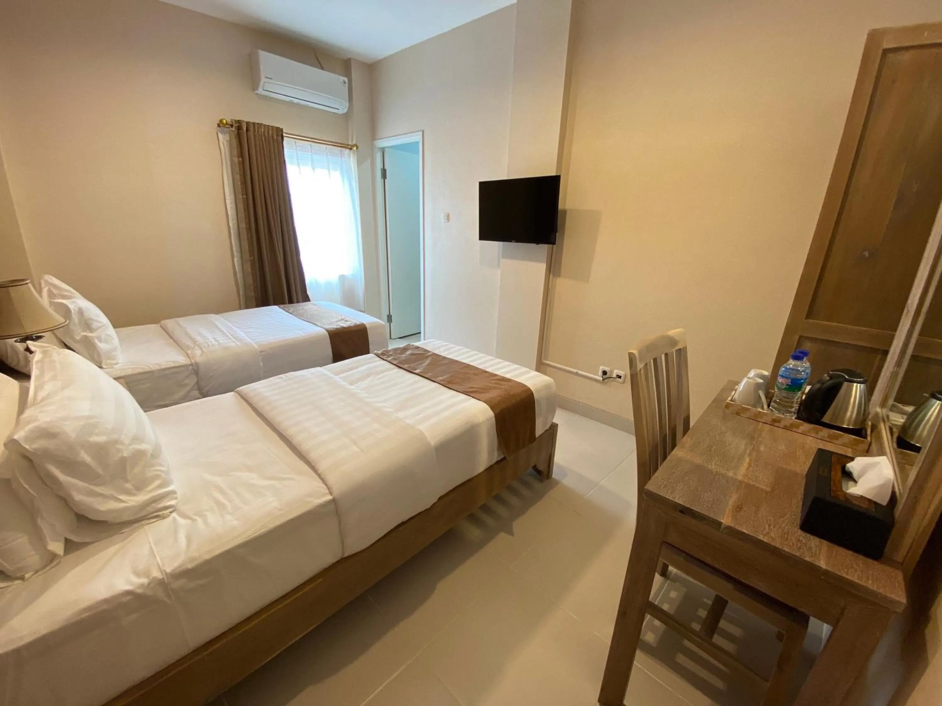 Bed in Flamingo Avia Labuan Bajo