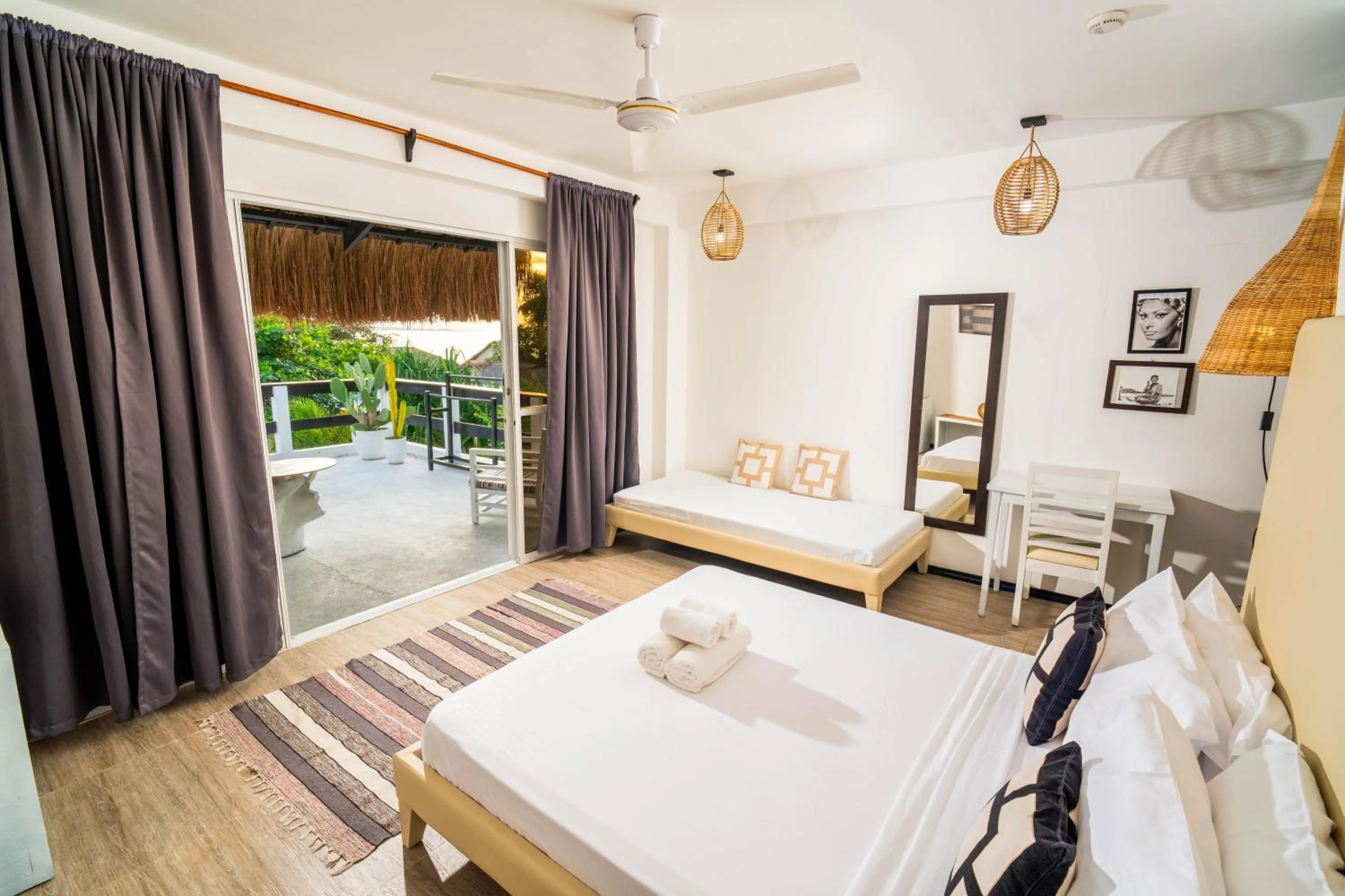 Photo of the whole room, Bed in Blanco Beach Resort Malapascua