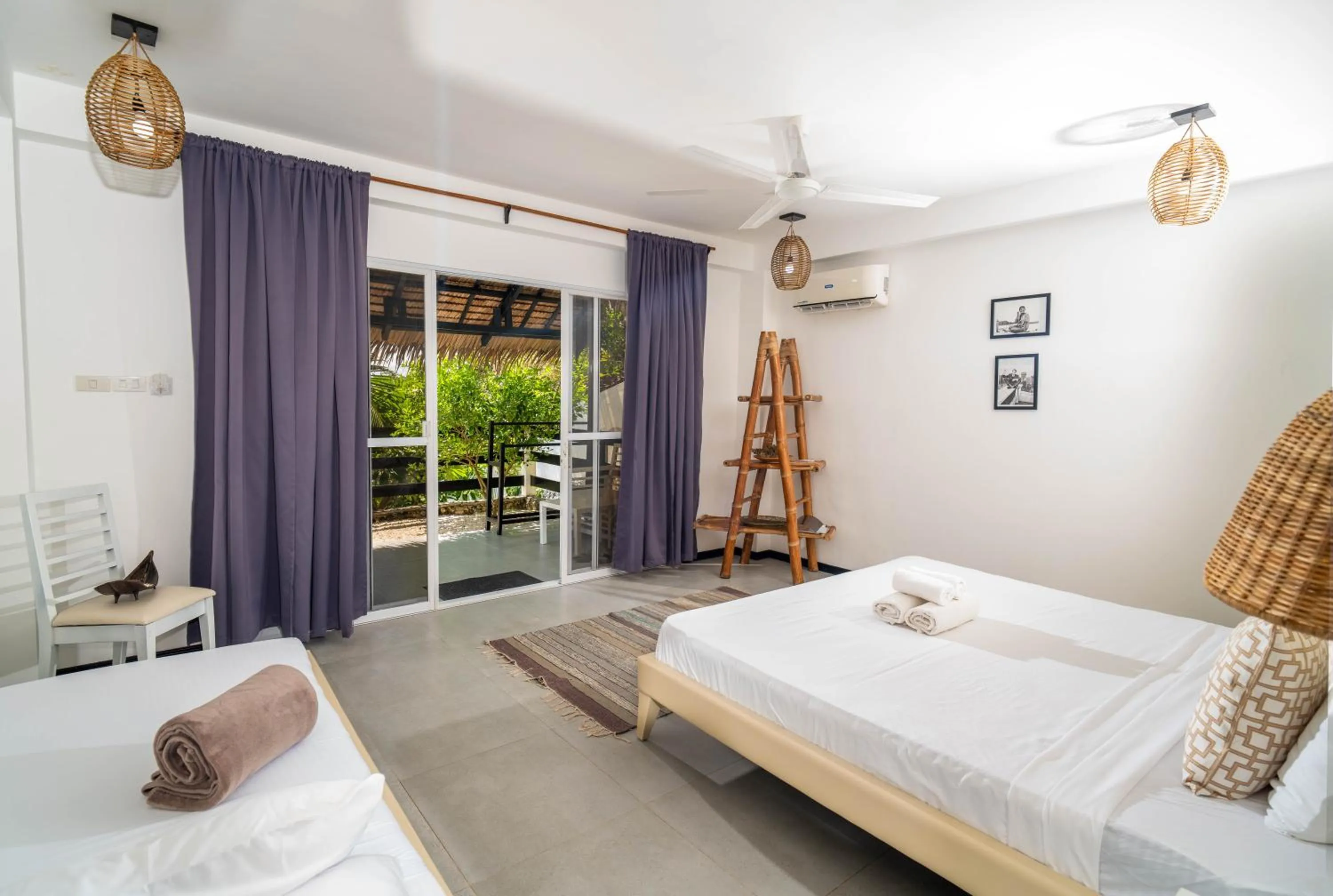 Photo of the whole room, Bed in Blanco Beach Resort Malapascua