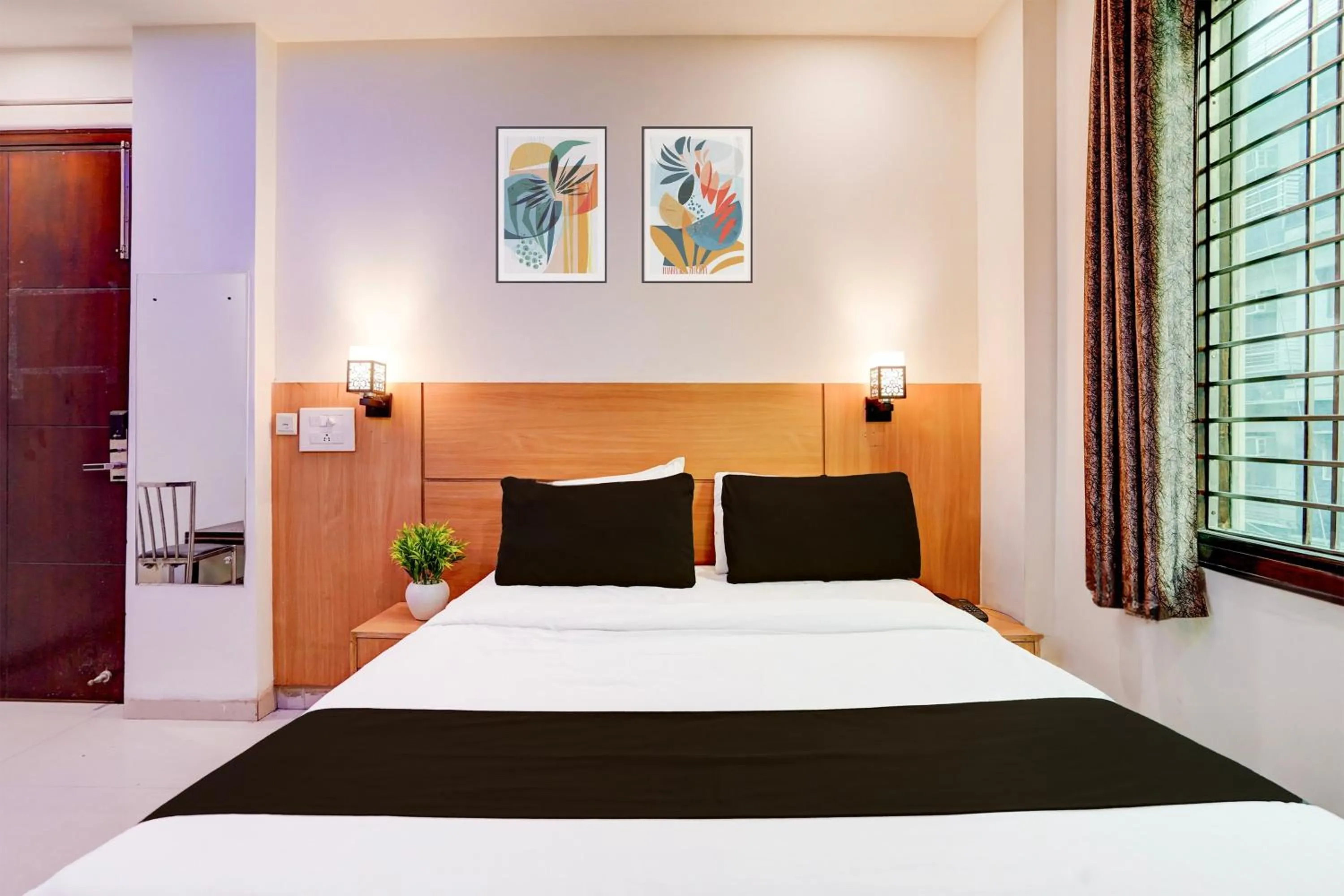 Bedroom, Bed in Super Hotel O Rohini Sector 24