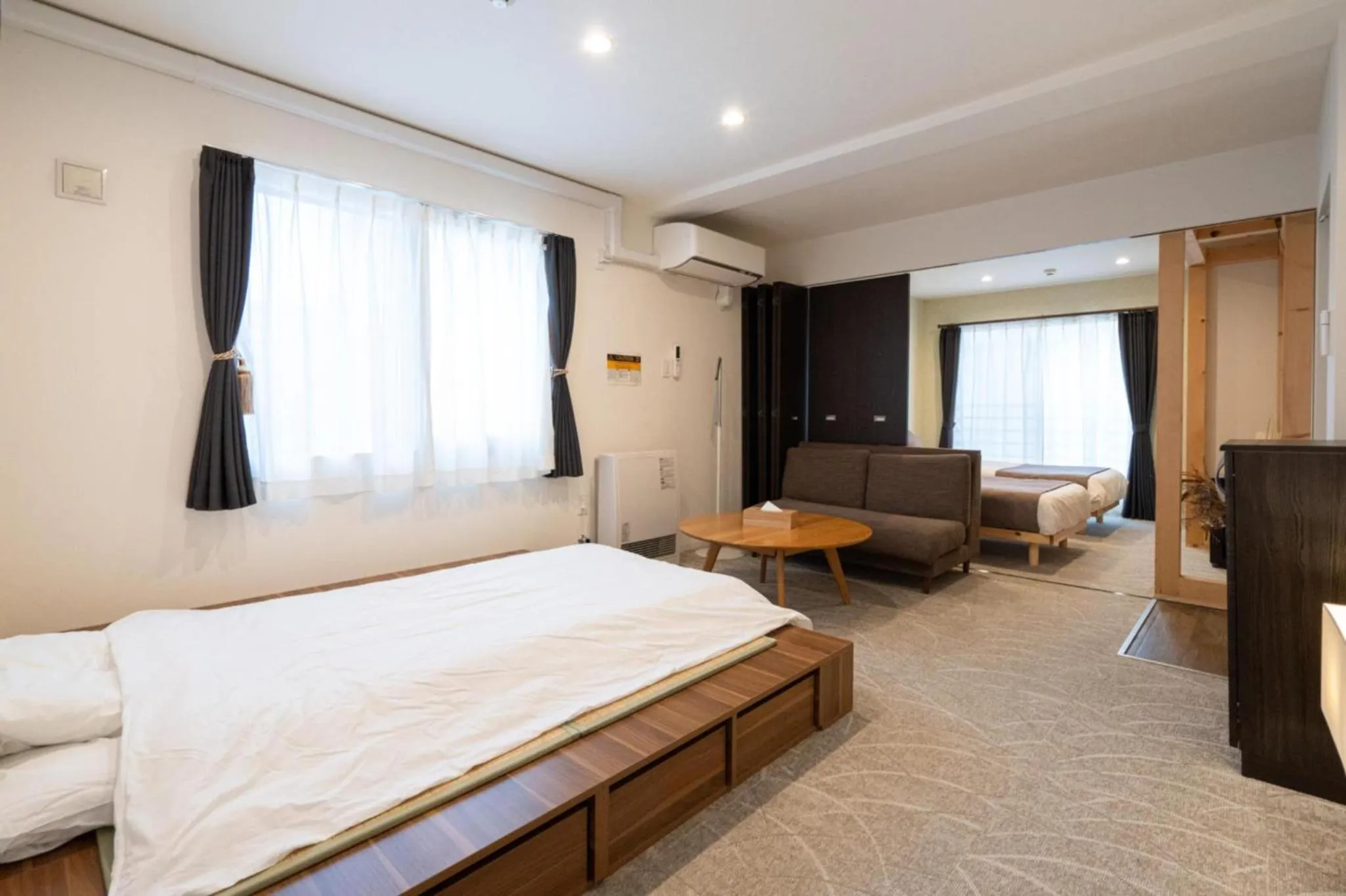 Living room, Bed in UCHI Susukino 5.7