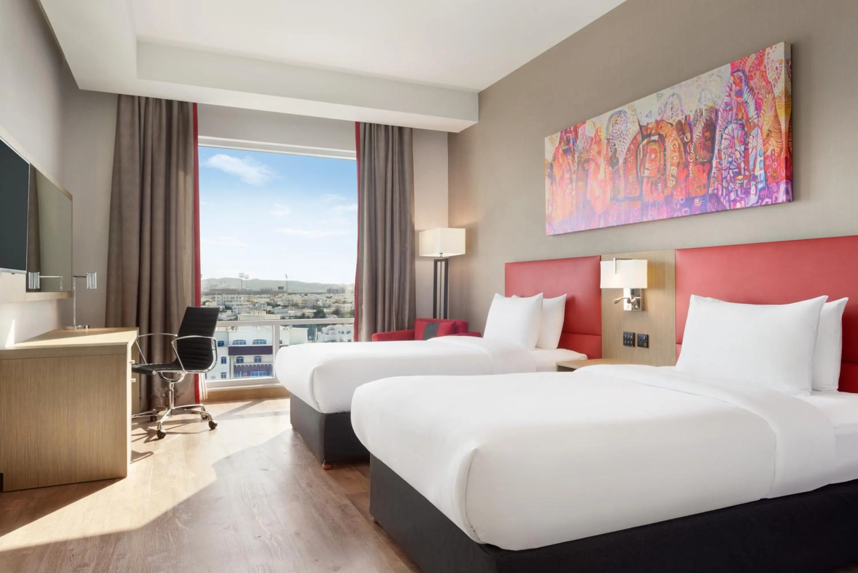 Bed in Ramada Encore by Wyndham Muscat Al-Ghubra