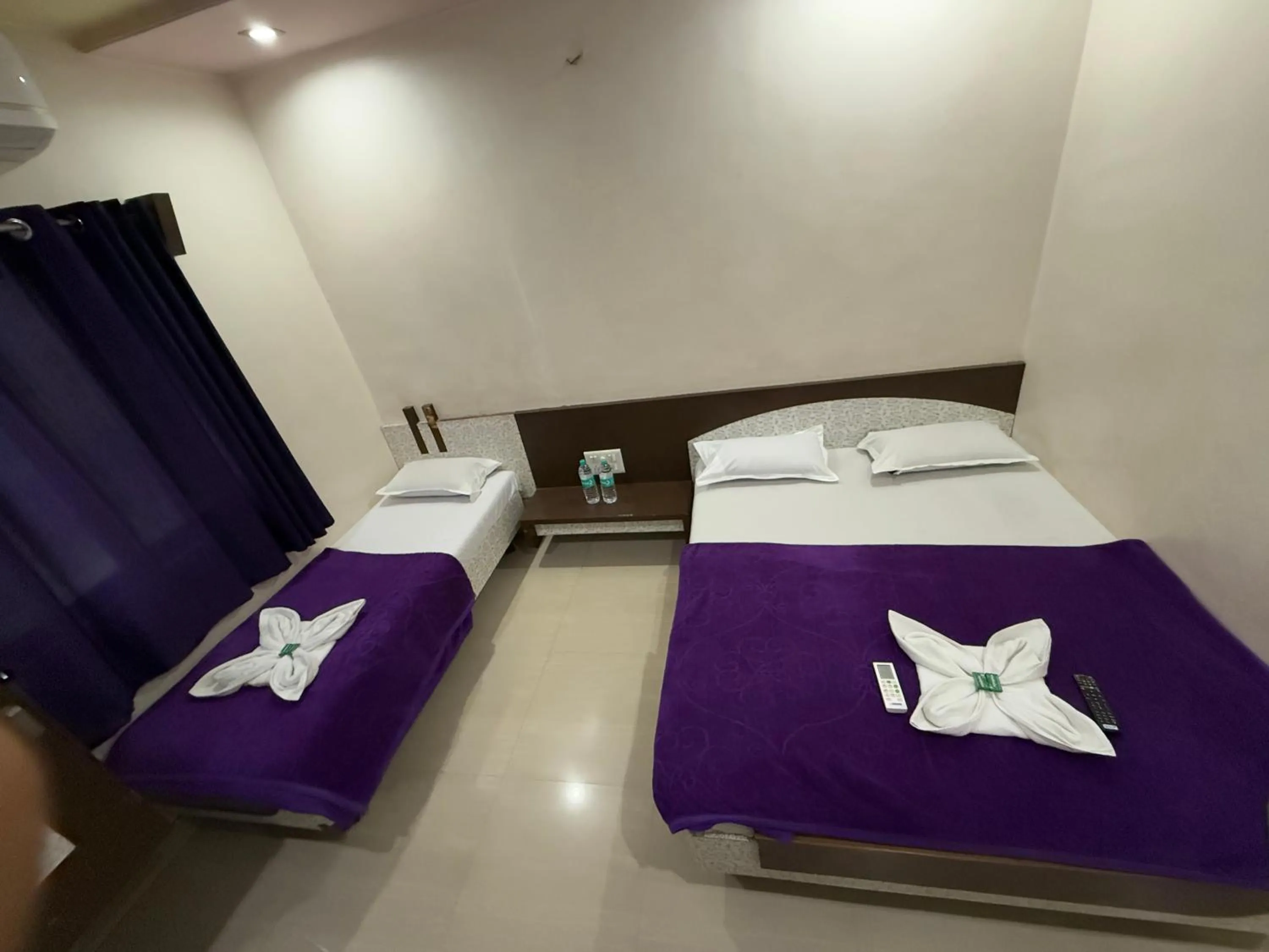 Bed in Hotel Temple Sai
