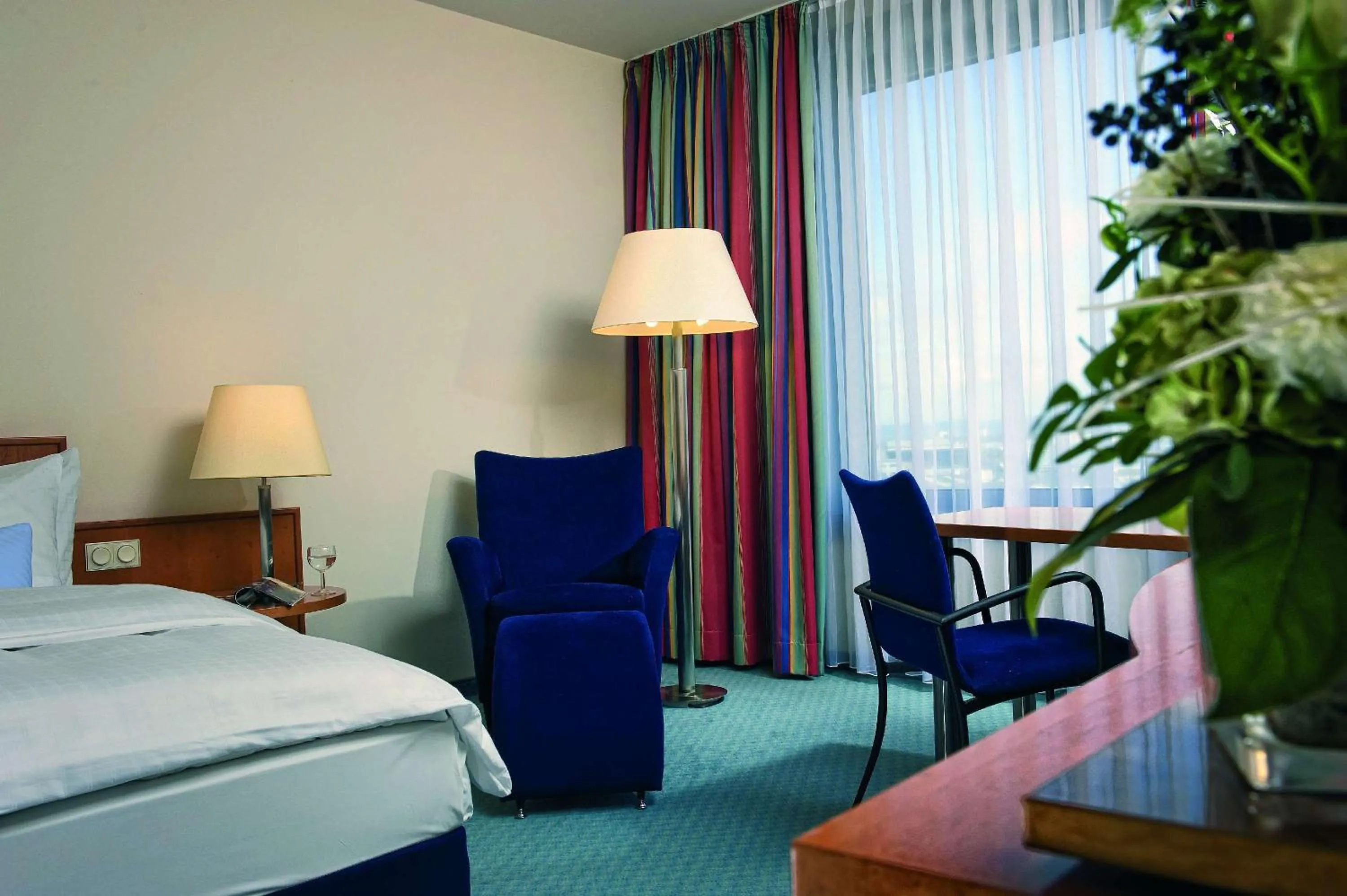 Seating area, Bed in Maritim Hotel Frankfurt