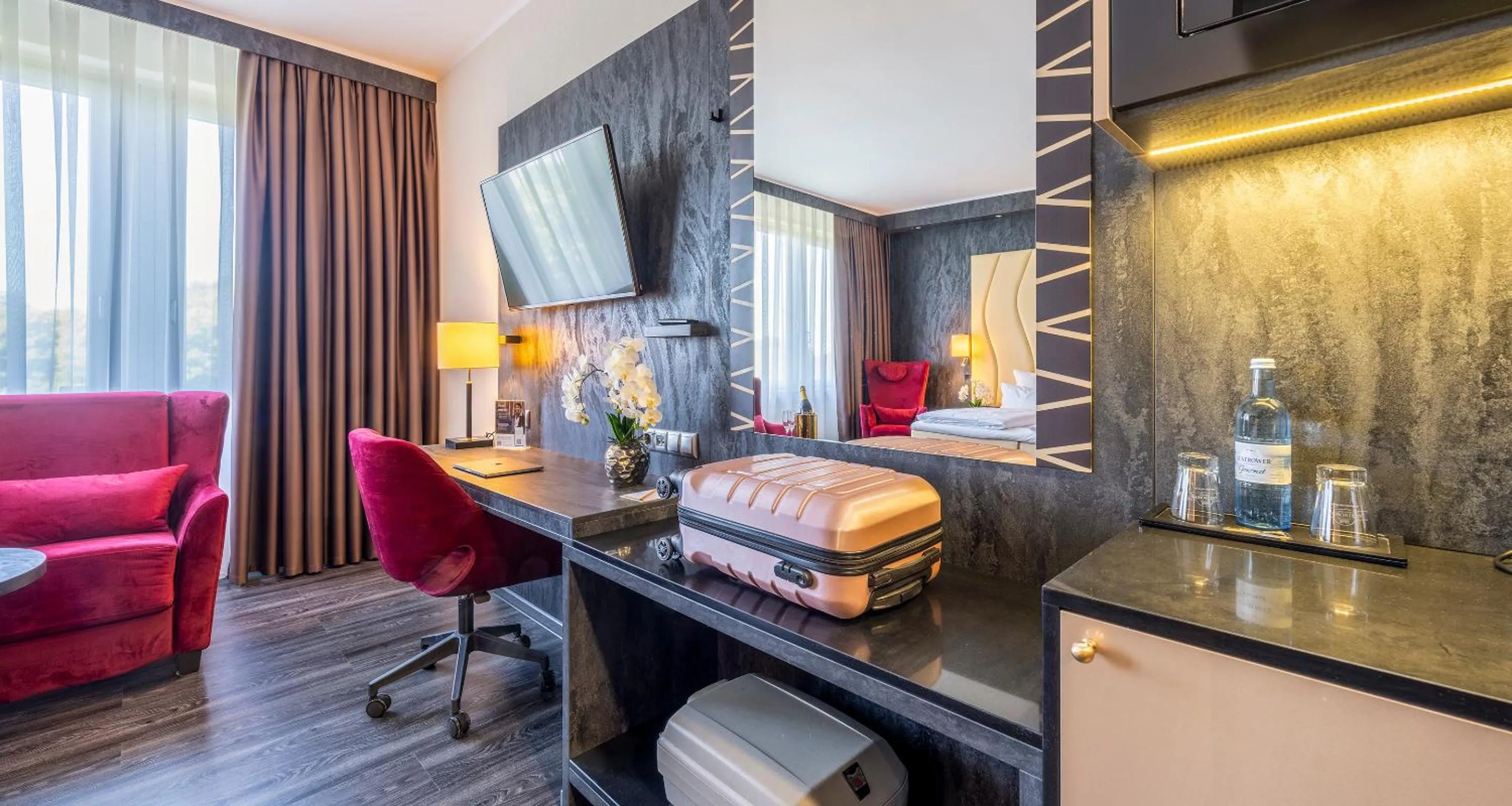 TV and multimedia in PLAZA Premium Schwerin Sure Hotel Collection by Best Western