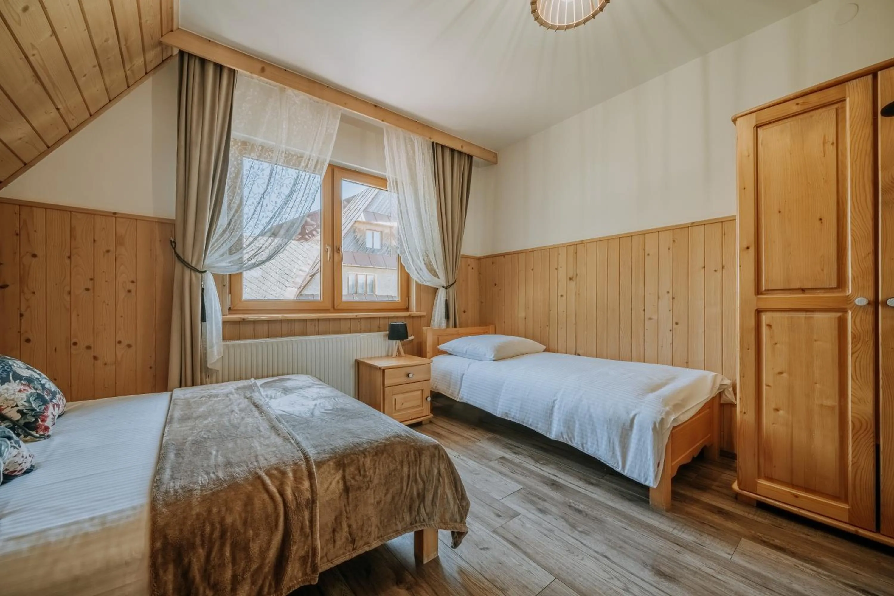 Bed in Gościna u Maryny Relaks i SPA w Ogrodzie