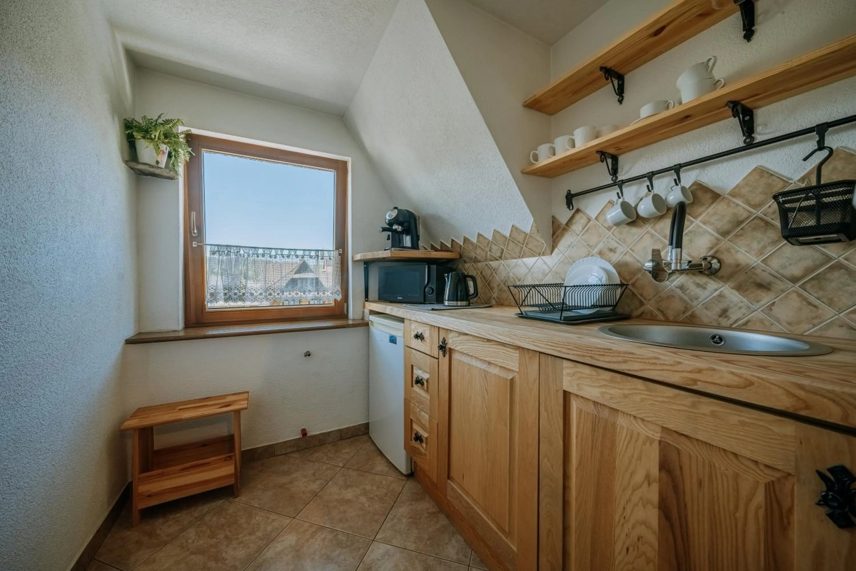 Kitchen or kitchenette in Gościna u Maryny Relaks i SPA w Ogrodzie