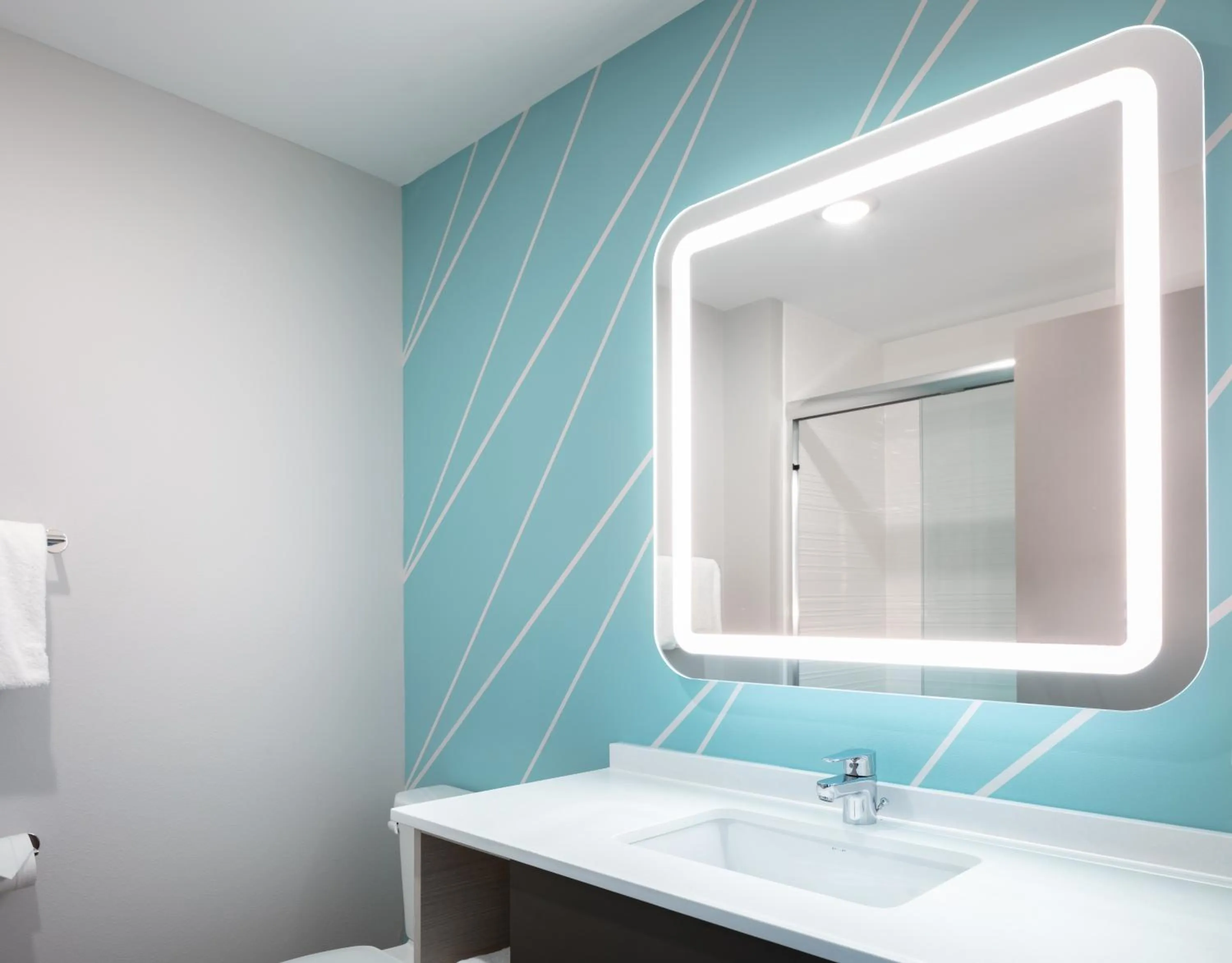 Bathroom in Avid Hotels - Roseville - Minneapolis North by IHG