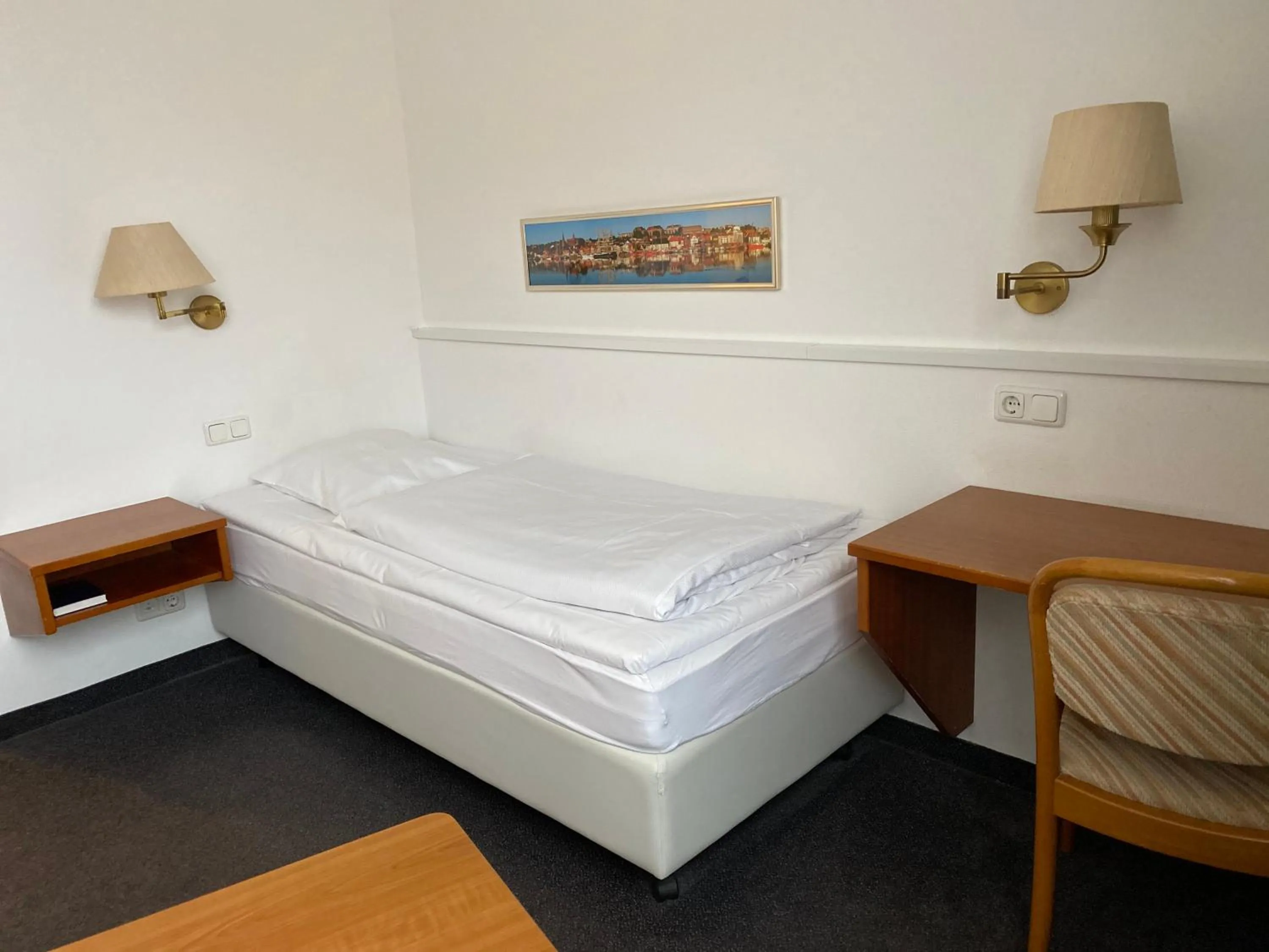 Photo of the whole room, Bed in Hotel Flensburger Hof