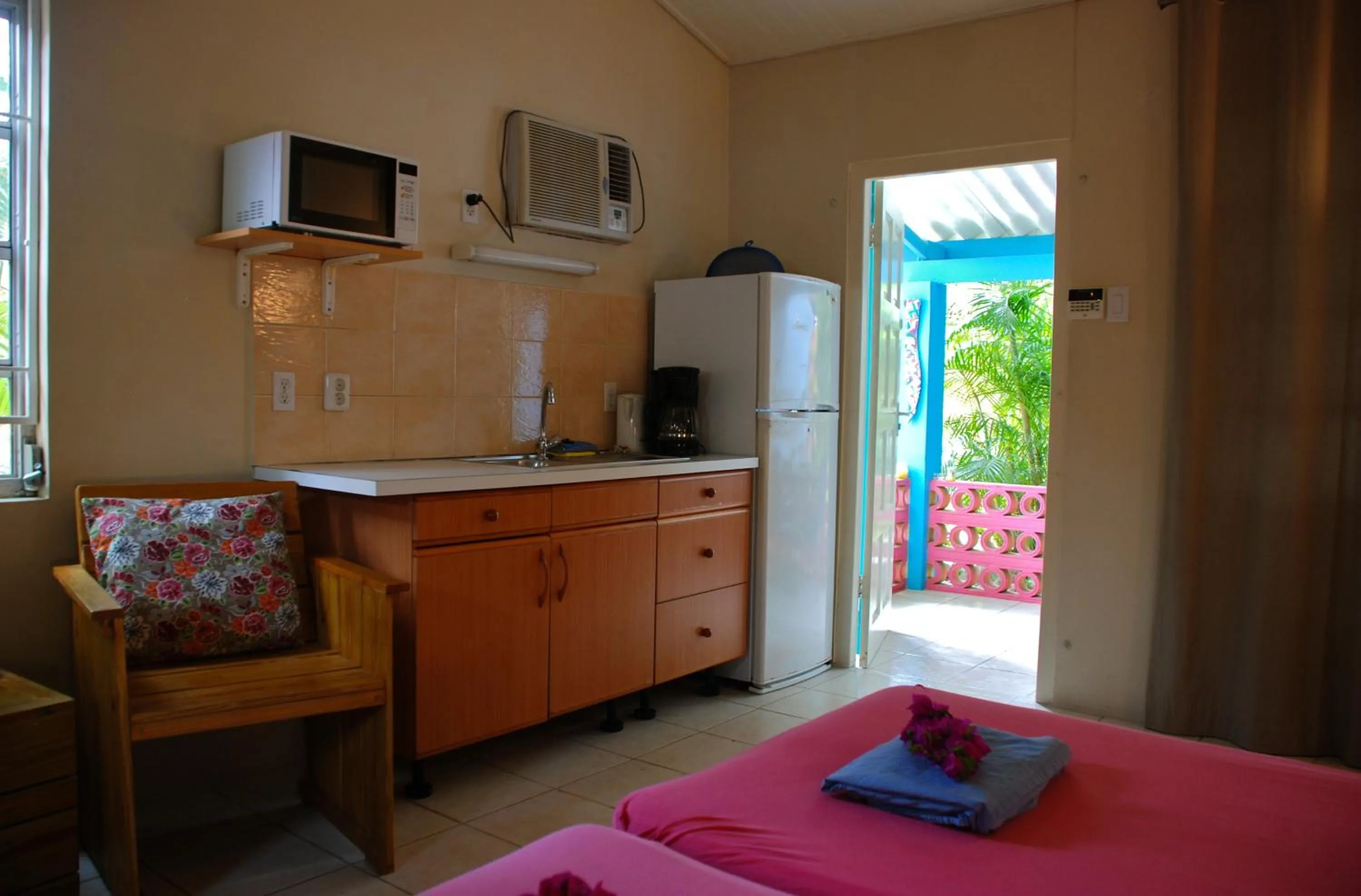 Kitchen or kitchenette in Caribbean Flower Apartments
