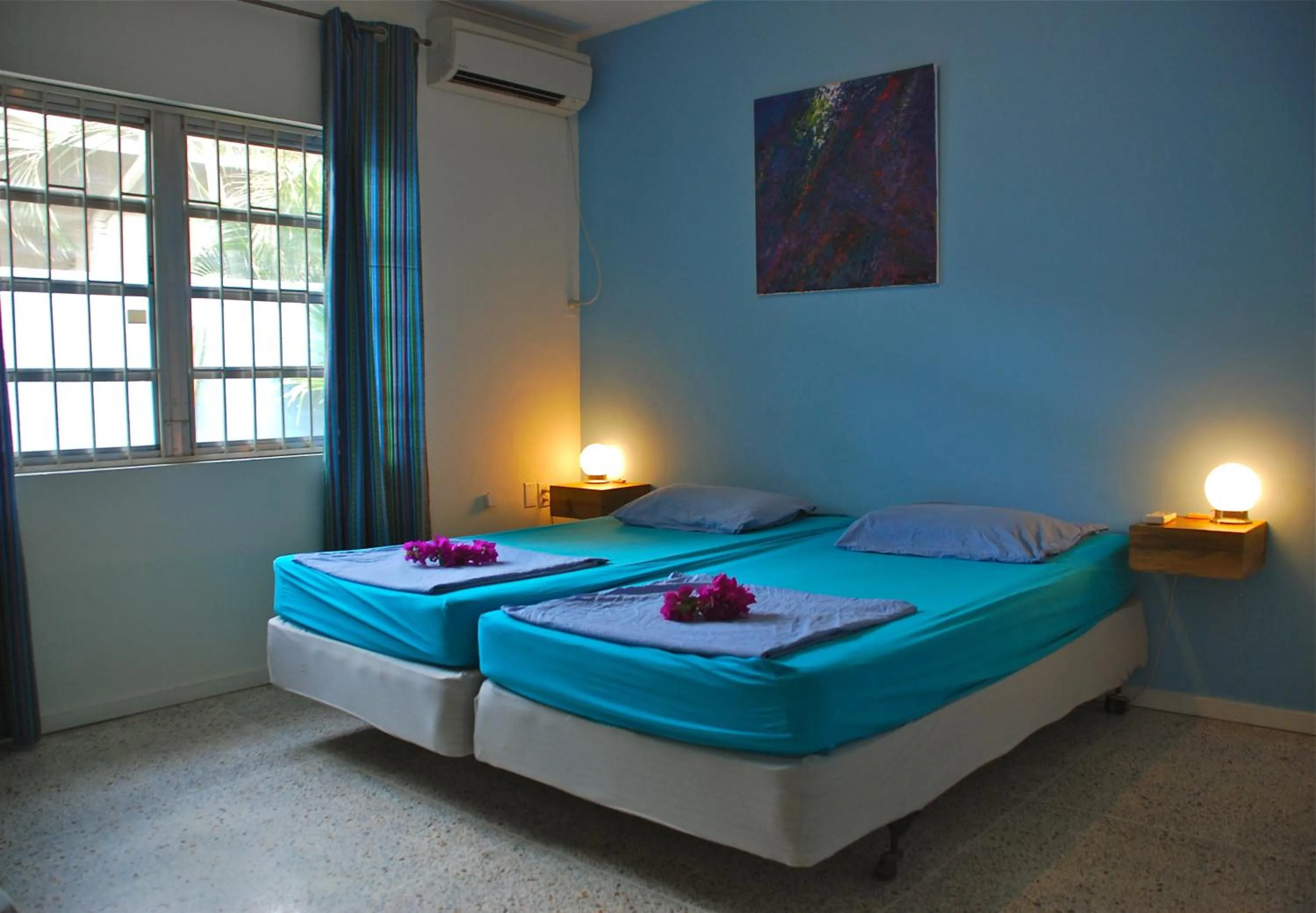 Bedroom, Bed in Caribbean Flower Apartments