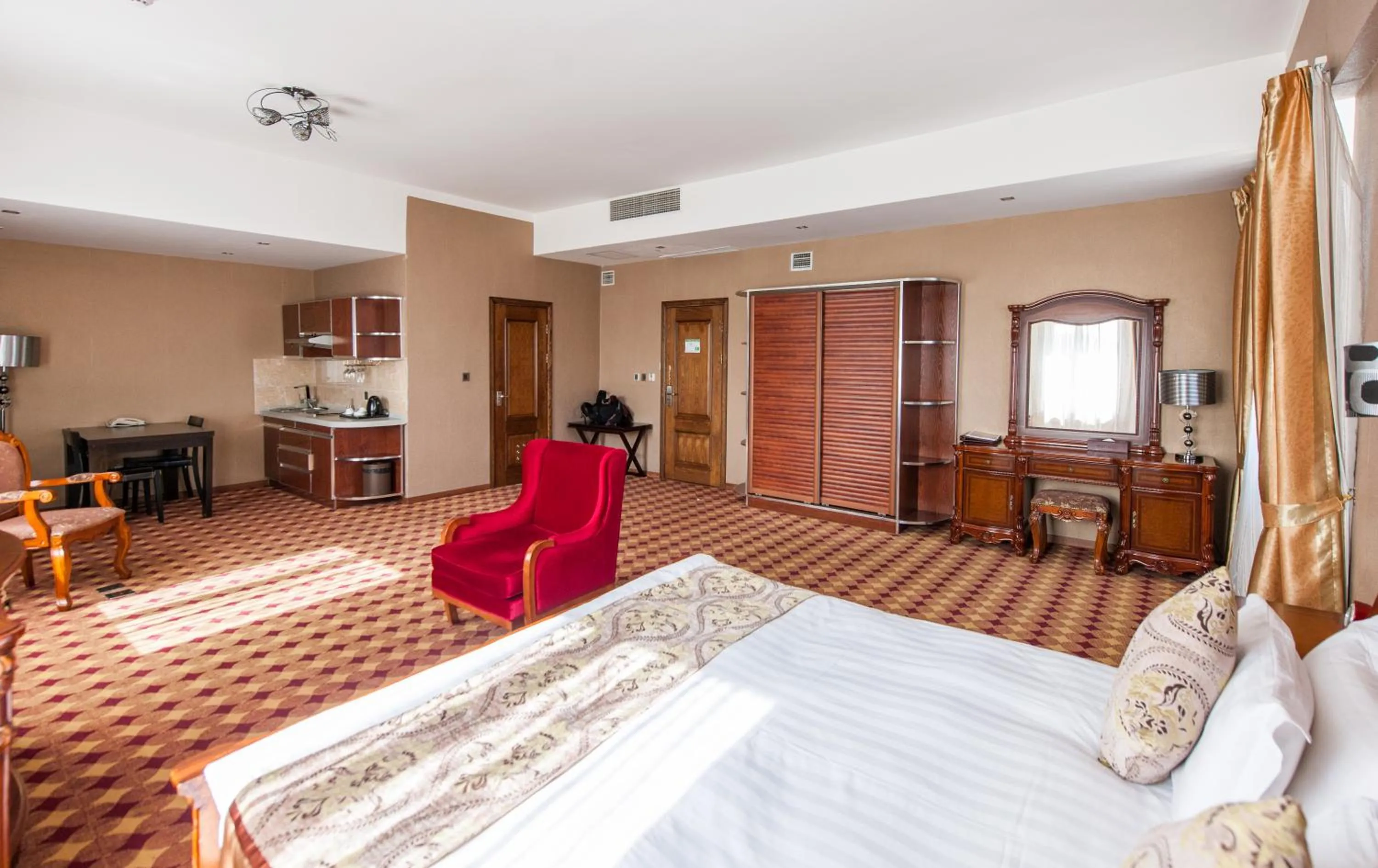 Photo of the whole room, Bed in UB City Hotel