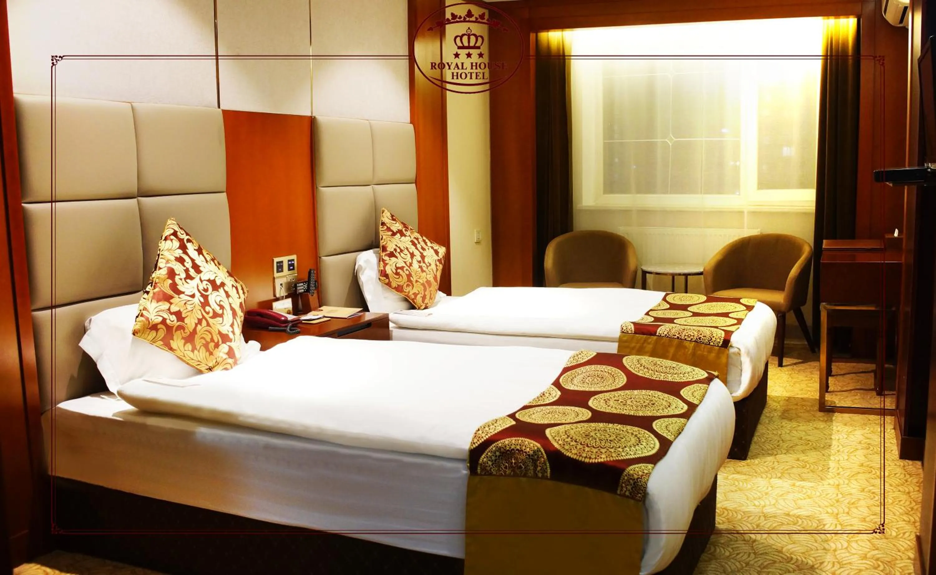 Bed in Royal House Hotel