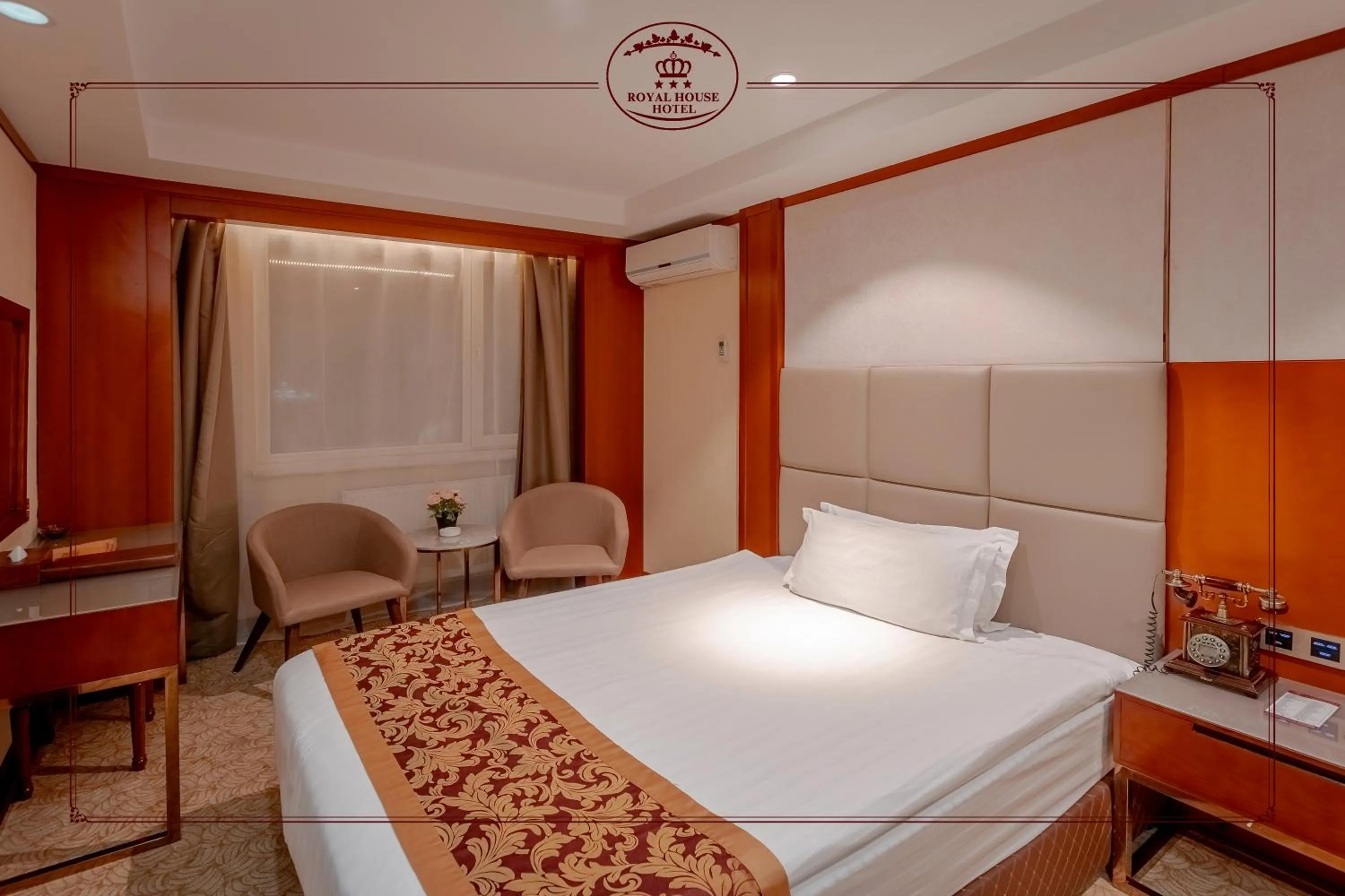 Bed in Royal House Hotel