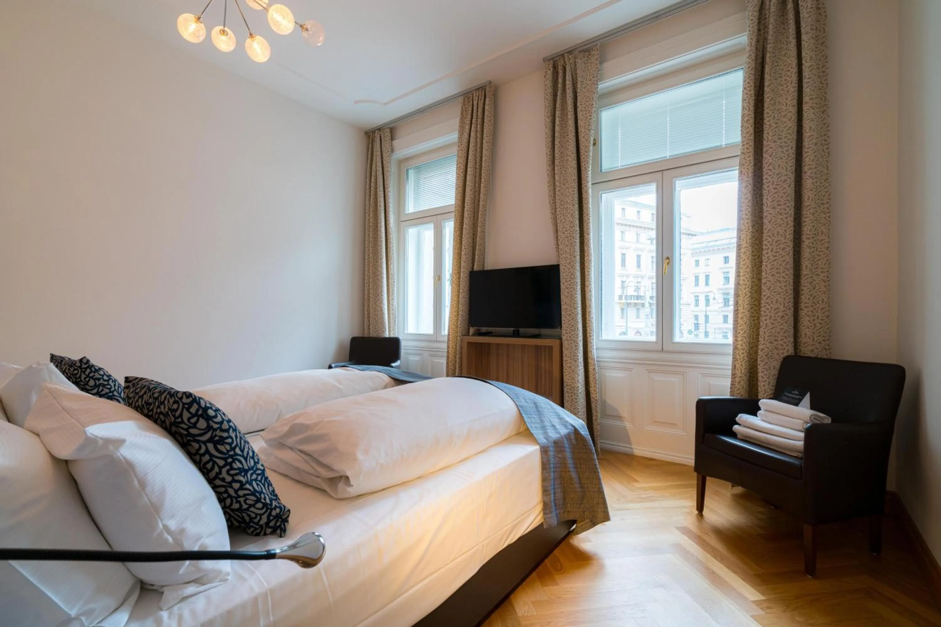 Bed in Vienna Residence, City Hall - Parliament