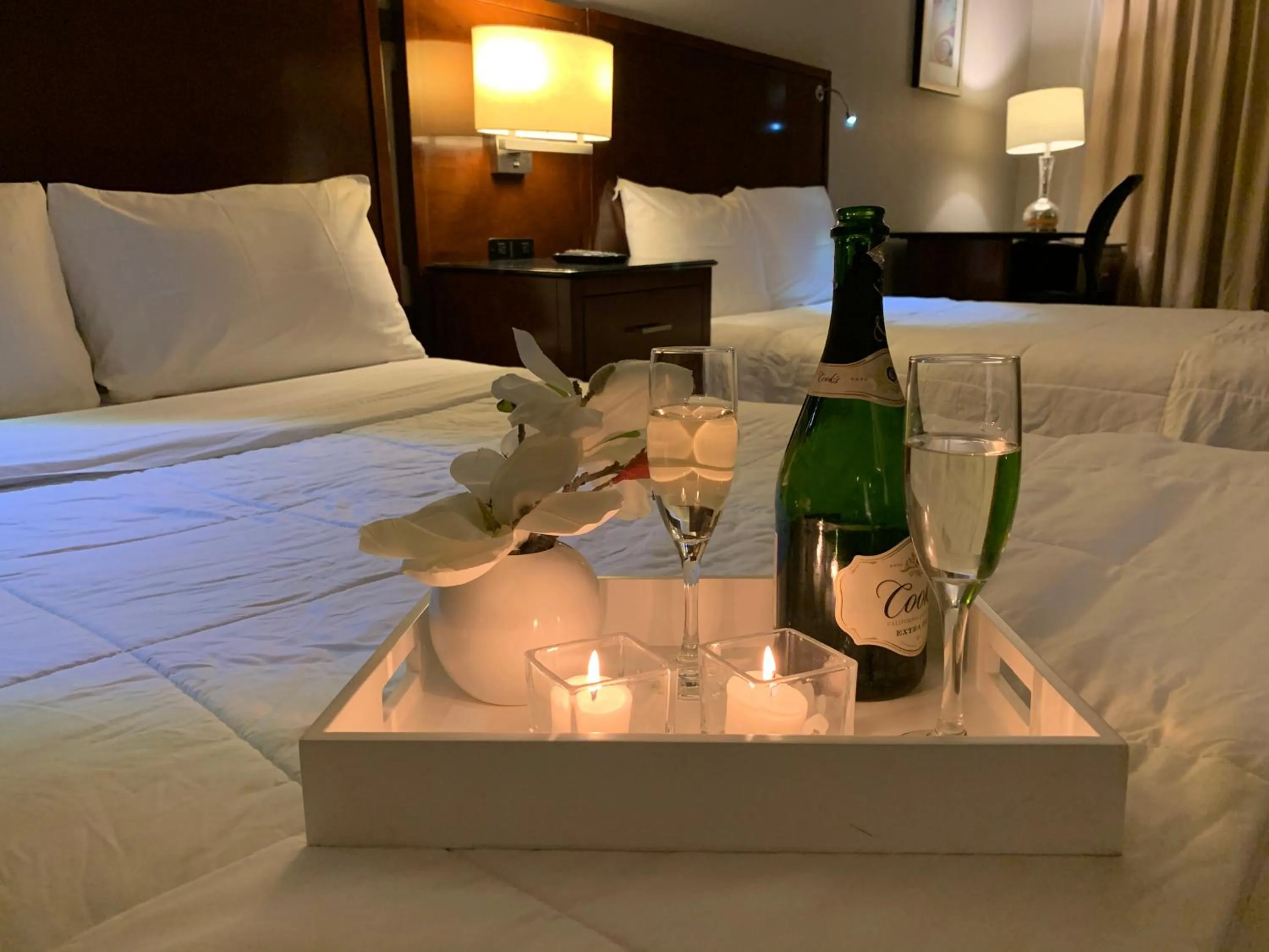 Bedroom, Bed in Stratus Suites Boutique Hotel