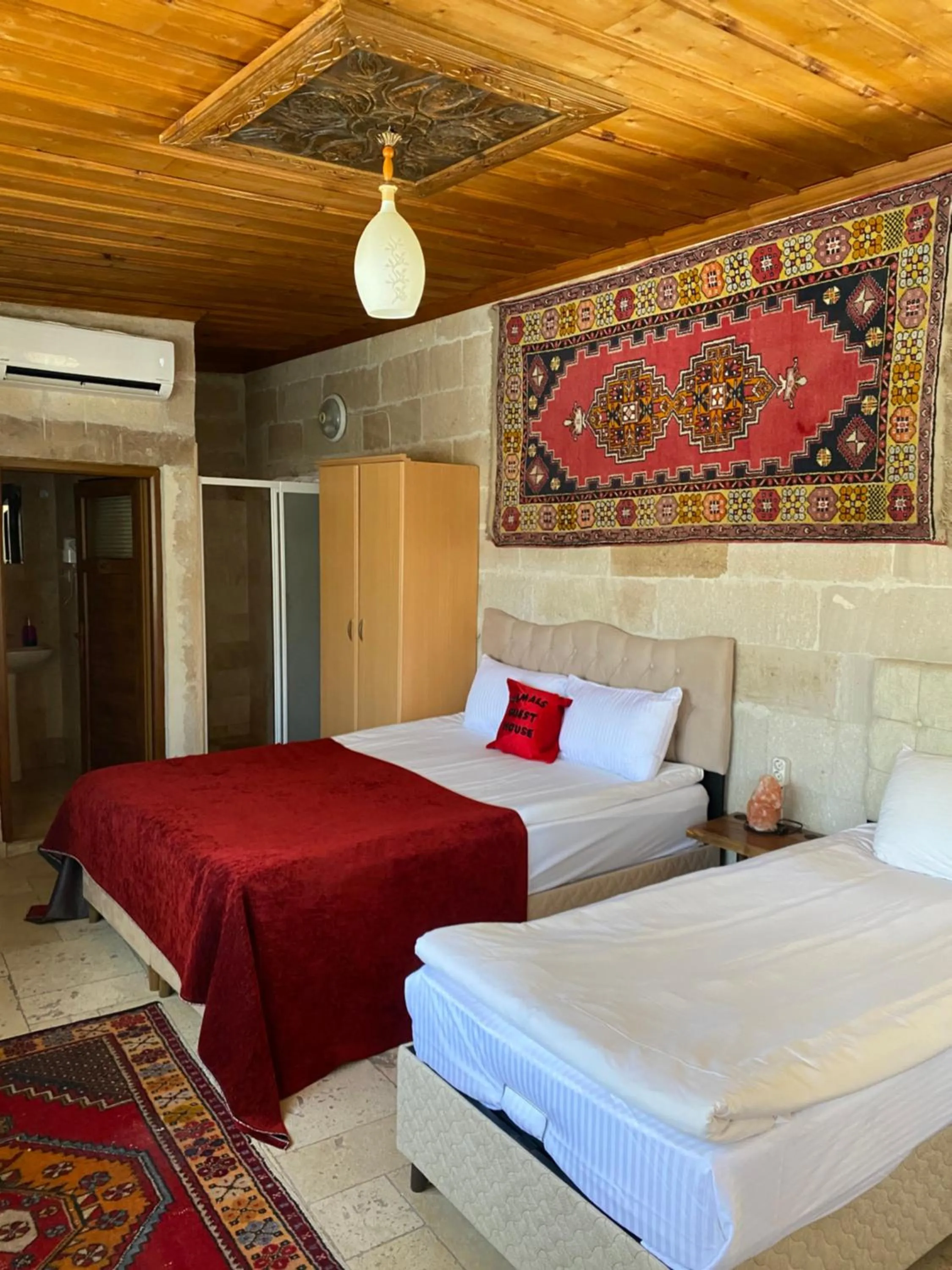 Bed in Kemal's Guest House