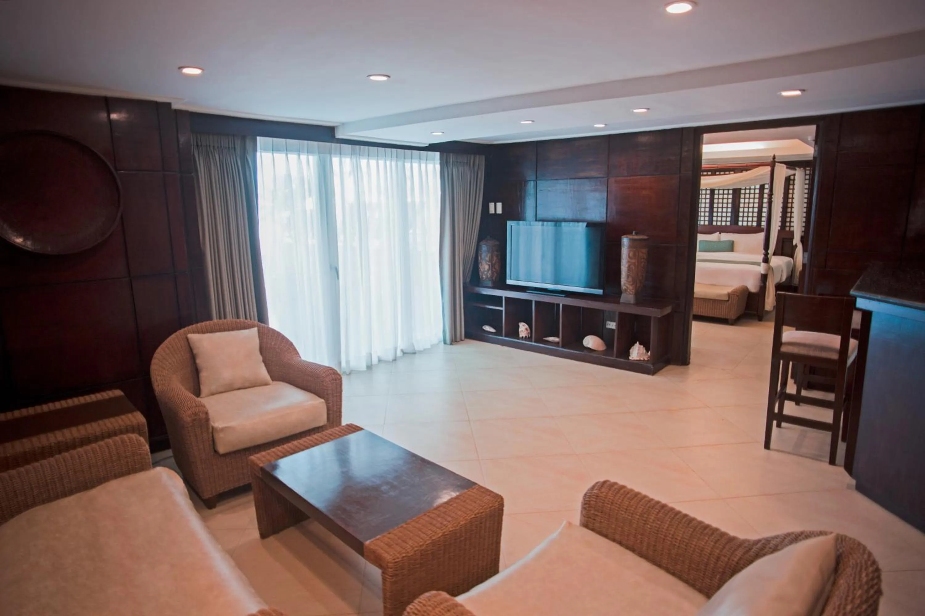 Living room, Bed in Boracay Mandarin Island Hotel