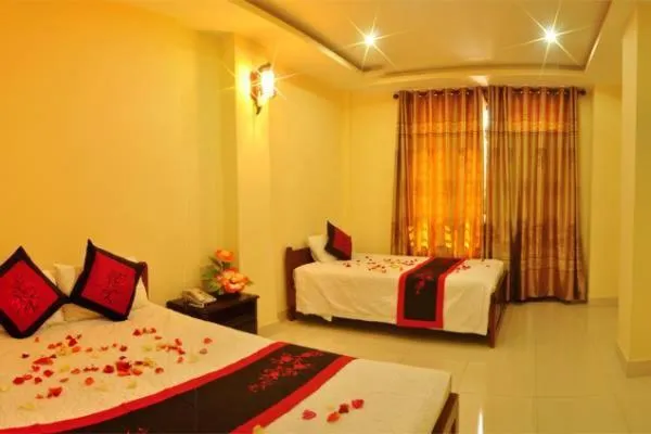 Bed in Champa Hue Hotel