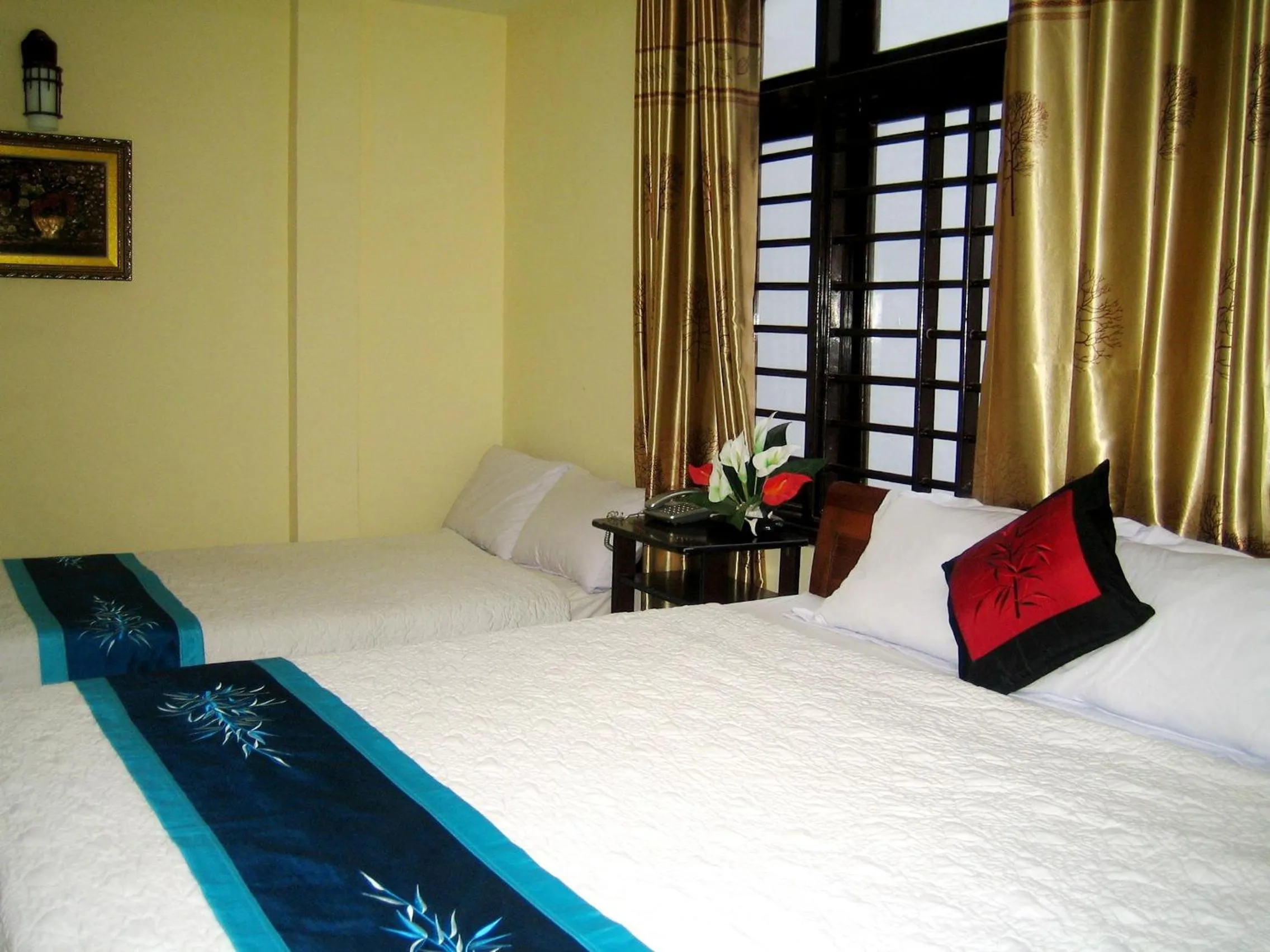 Bed in Champa Hue Hotel