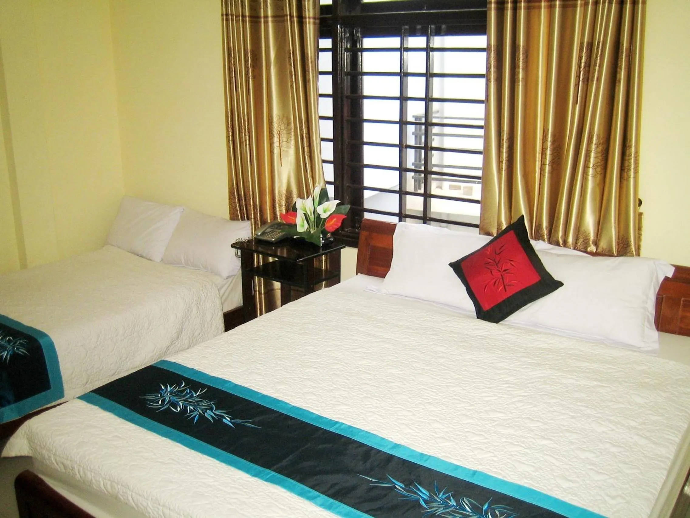 Bed in Champa Hue Hotel