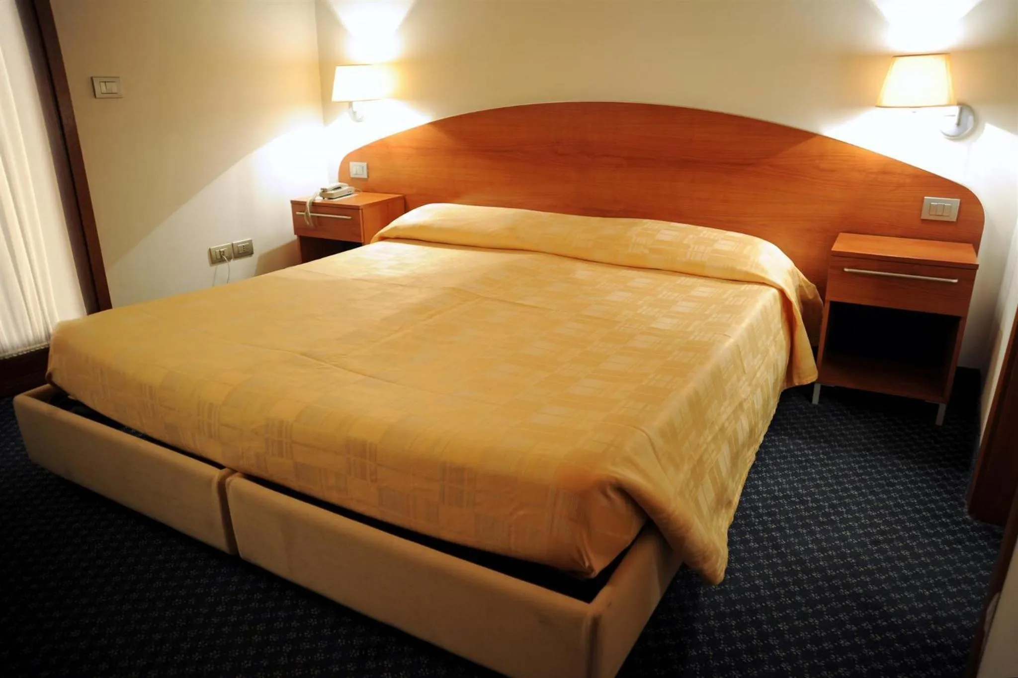 Bed in Hotel Vittoria