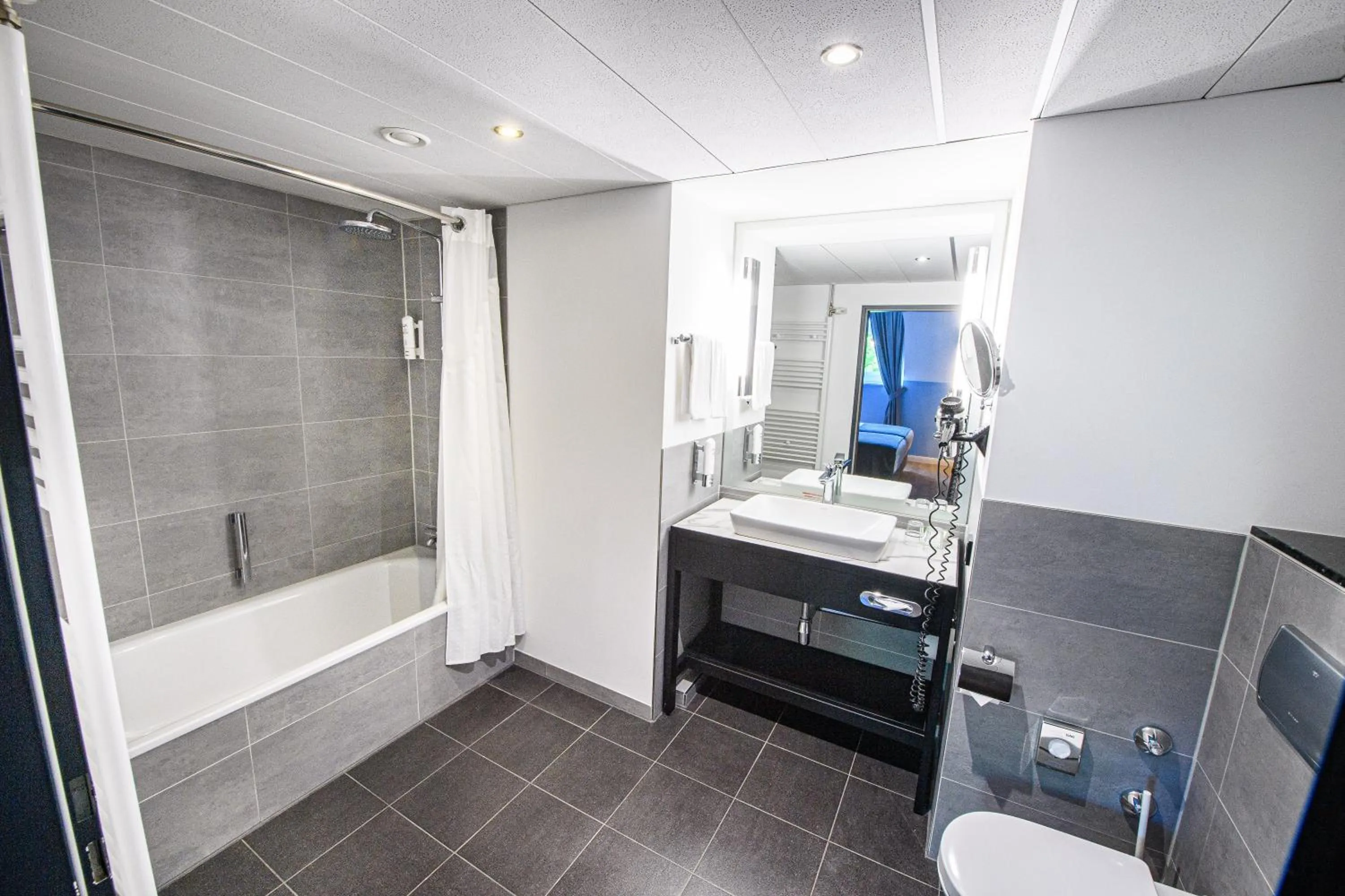 Bathroom in Holiday Inn Lübeck by IHG