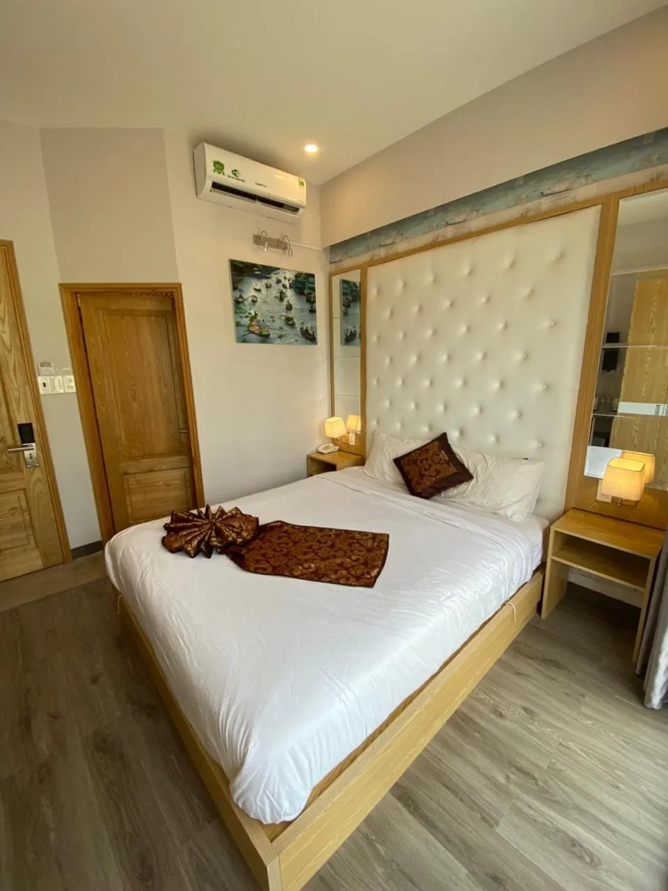 Bed in EMERALD OCEAN HOTEL