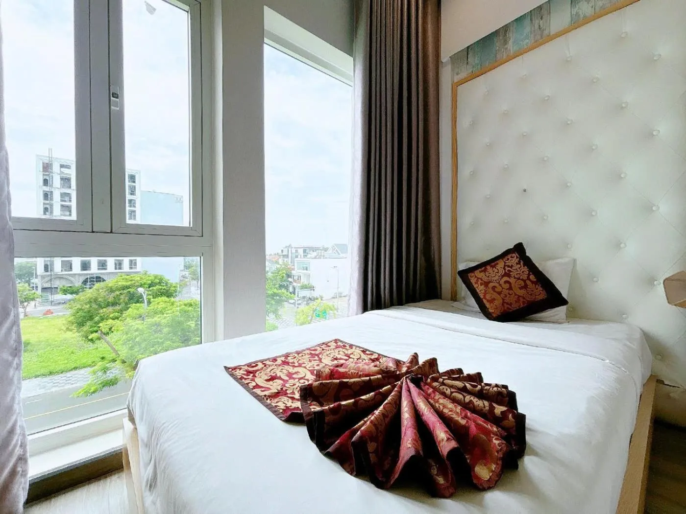 Bed in EMERALD OCEAN HOTEL