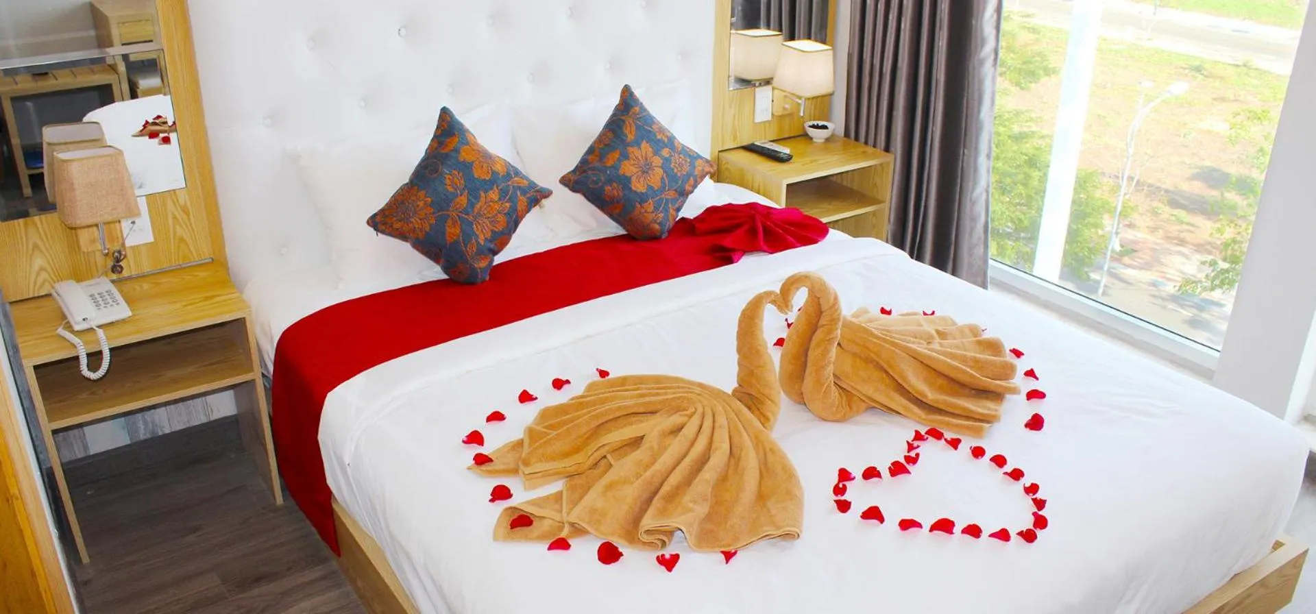 Bed in EMERALD OCEAN HOTEL