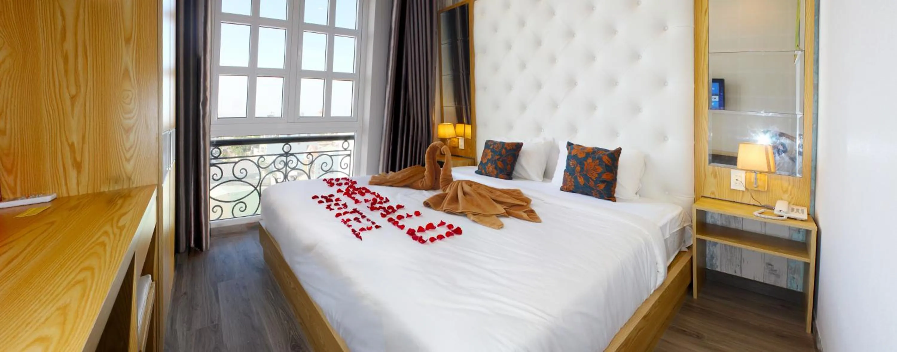 Bed in EMERALD OCEAN HOTEL