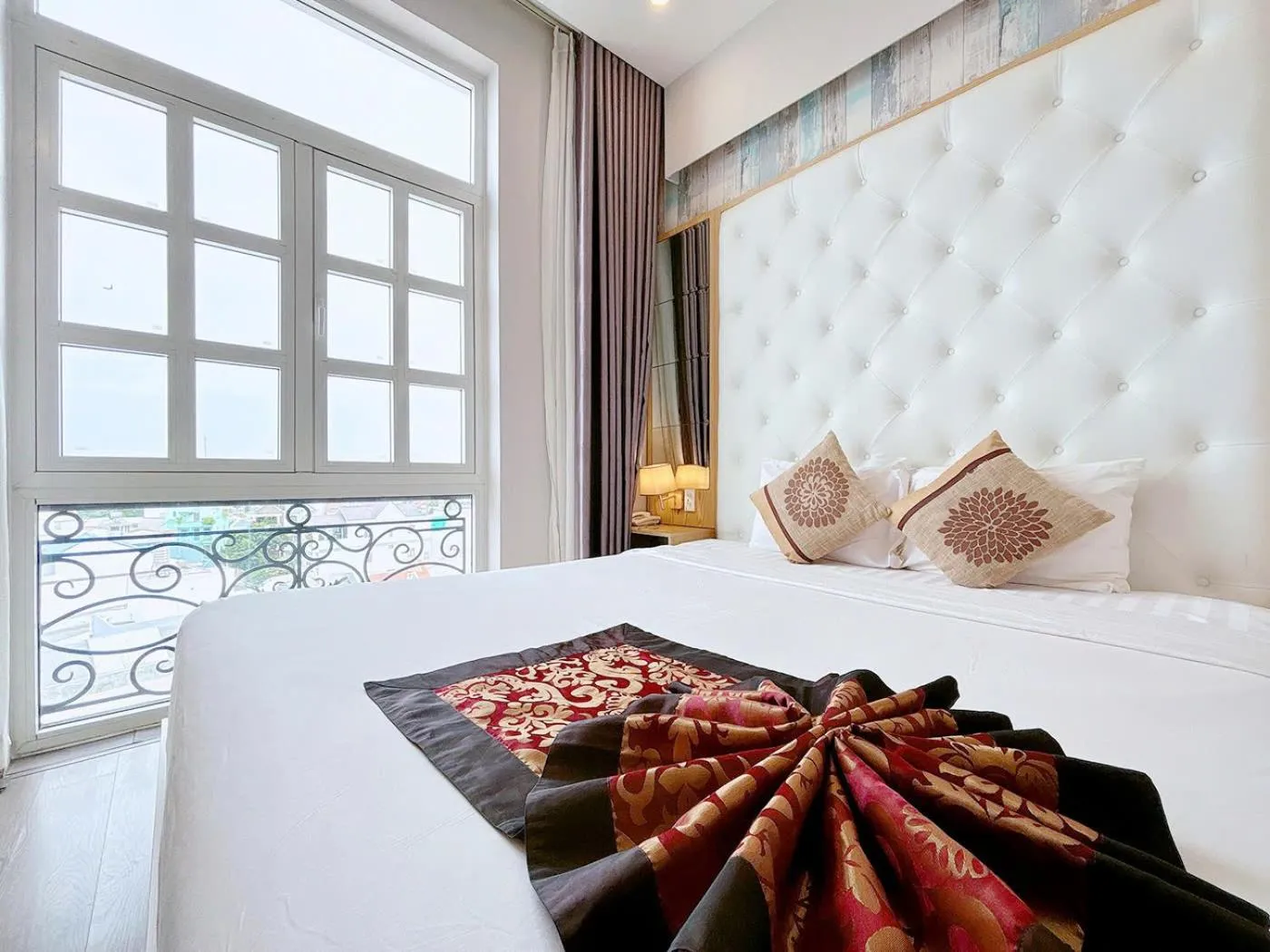 Bed in EMERALD OCEAN HOTEL