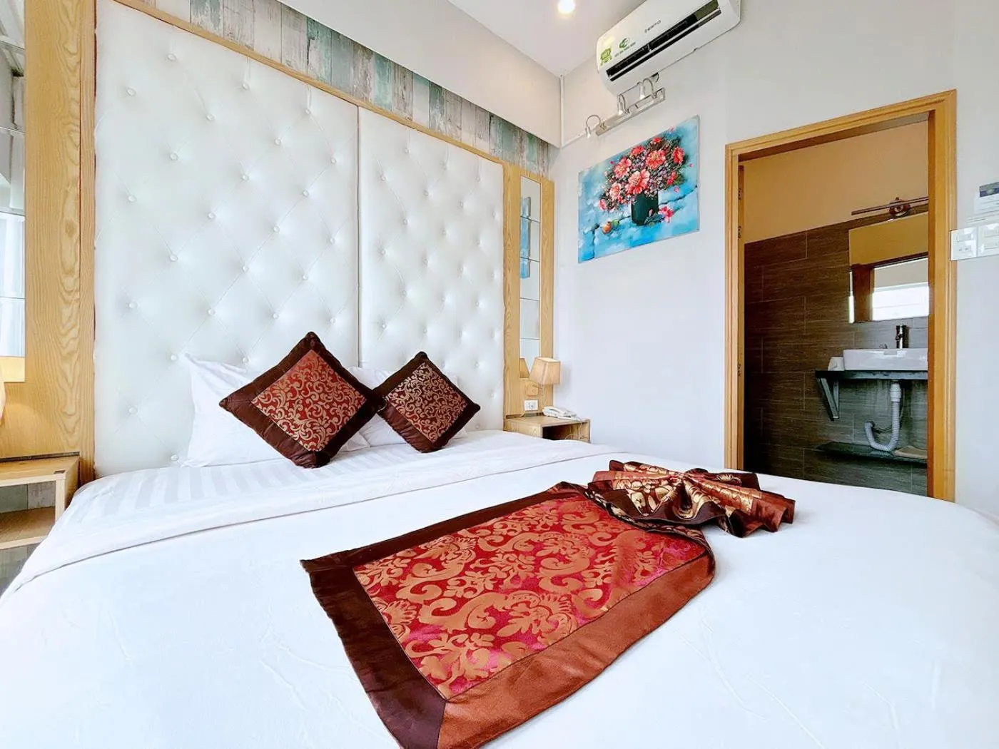 Bed in EMERALD OCEAN HOTEL