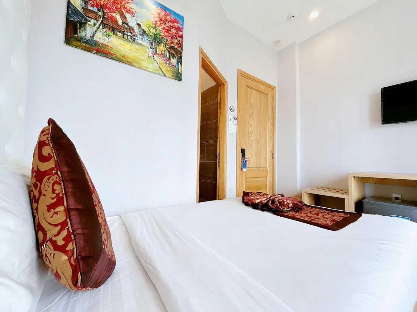 Bed in EMERALD OCEAN HOTEL