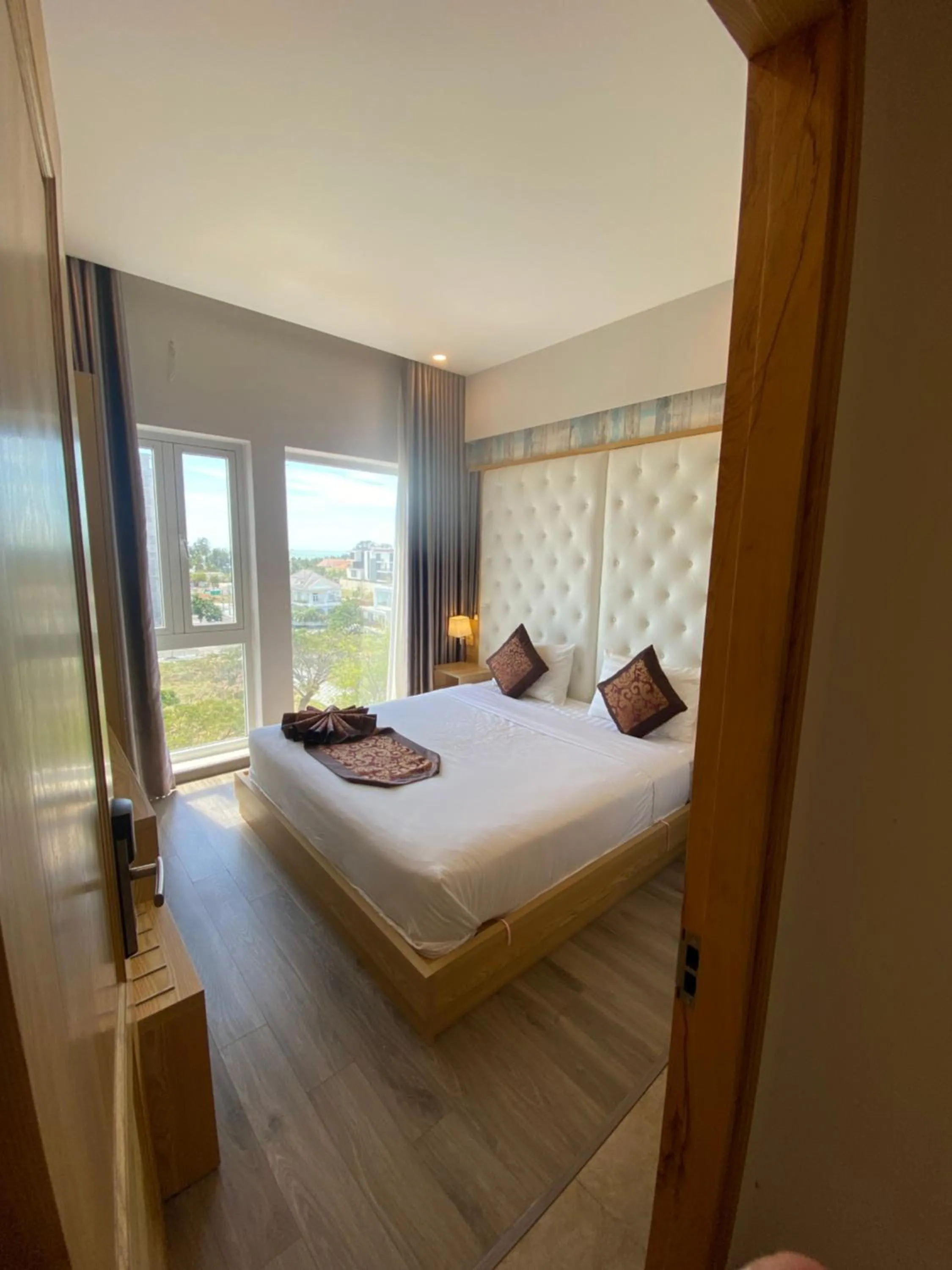 Bed in EMERALD OCEAN HOTEL