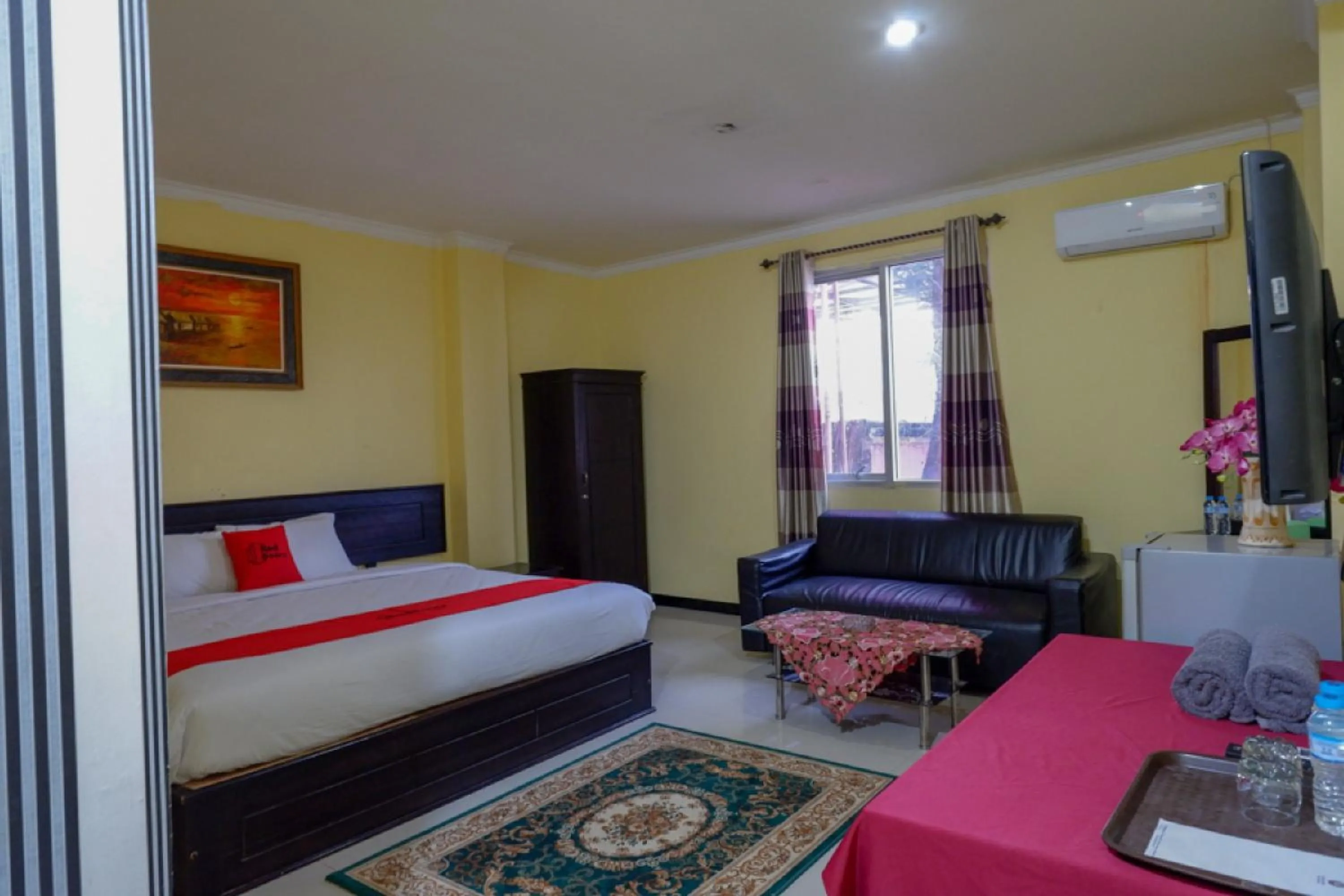 Bed in RedDoorz near Citraland Waterpark Kendari