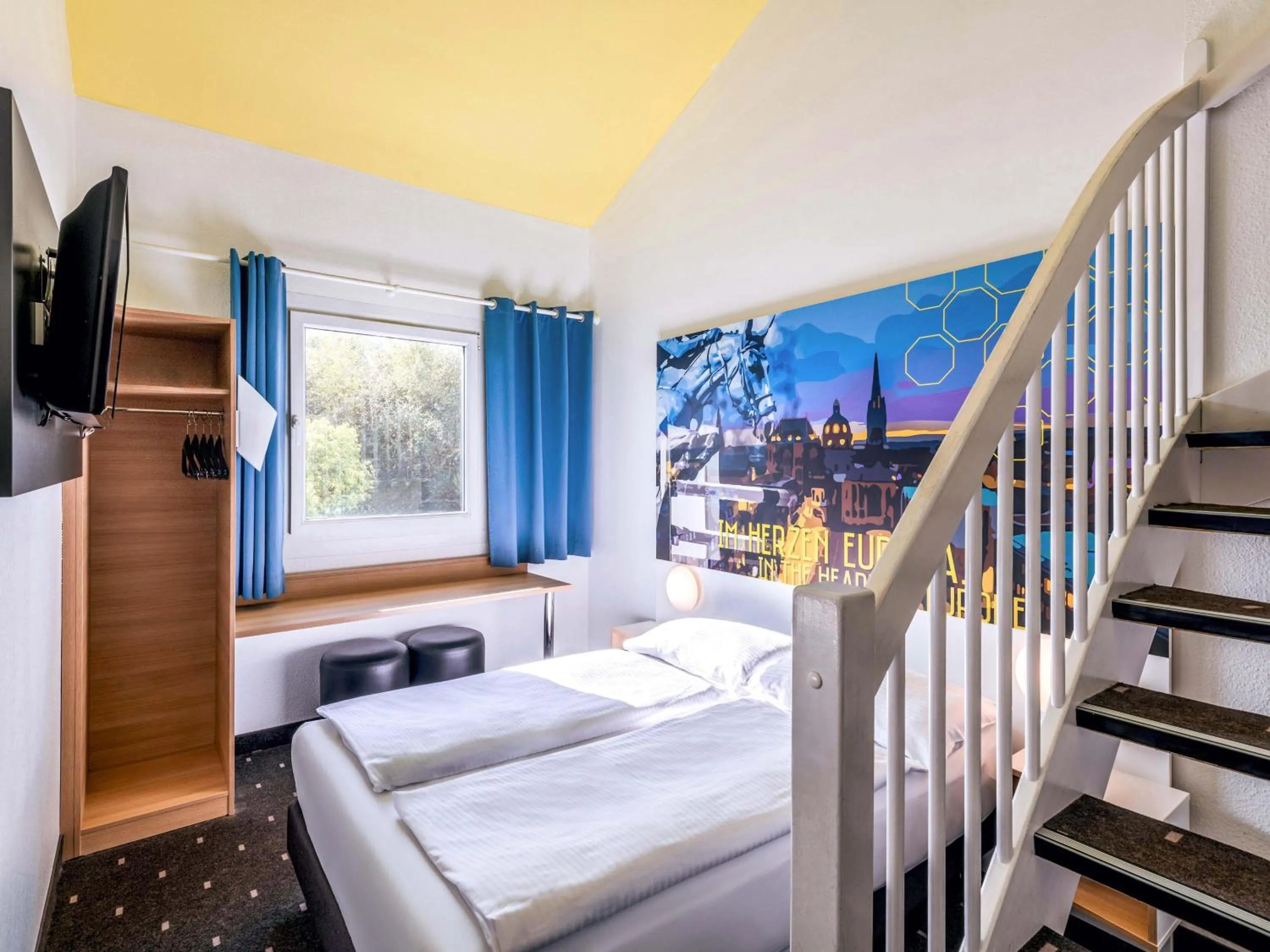 Photo of the whole room, Bed in B&B HOTEL Aachen-Würselen