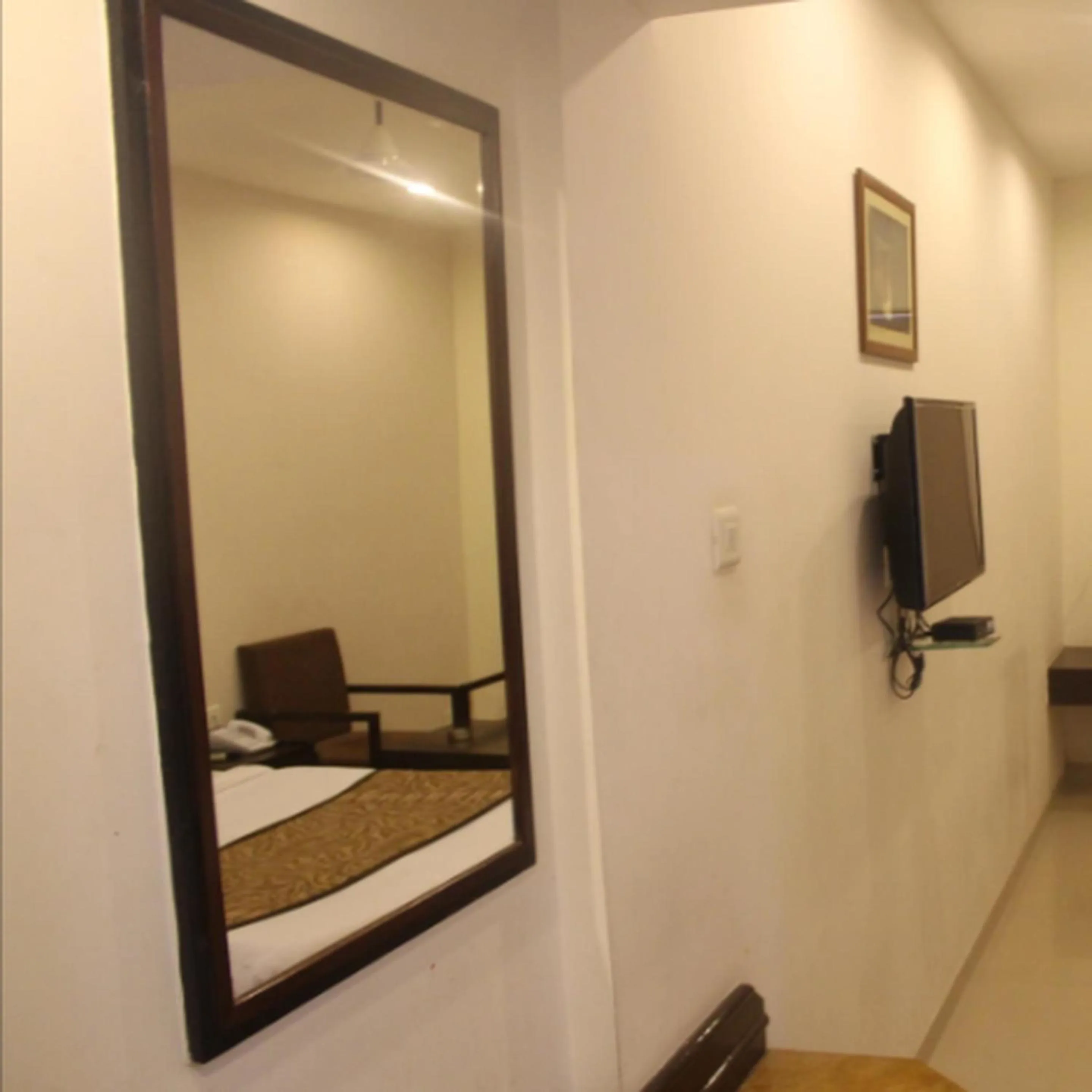 Bedroom in Regency Square Hotel