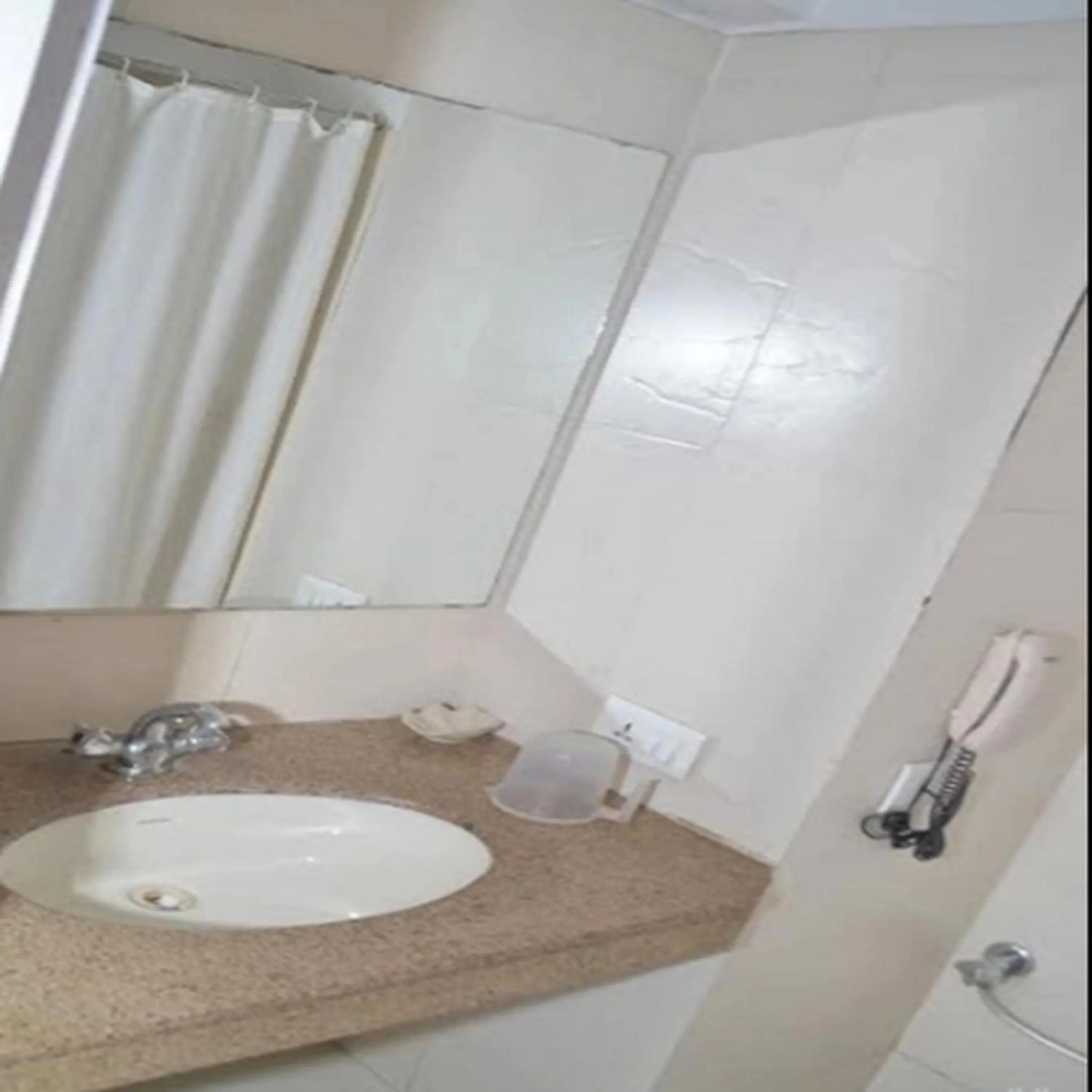 Bathroom in Regency Square Hotel