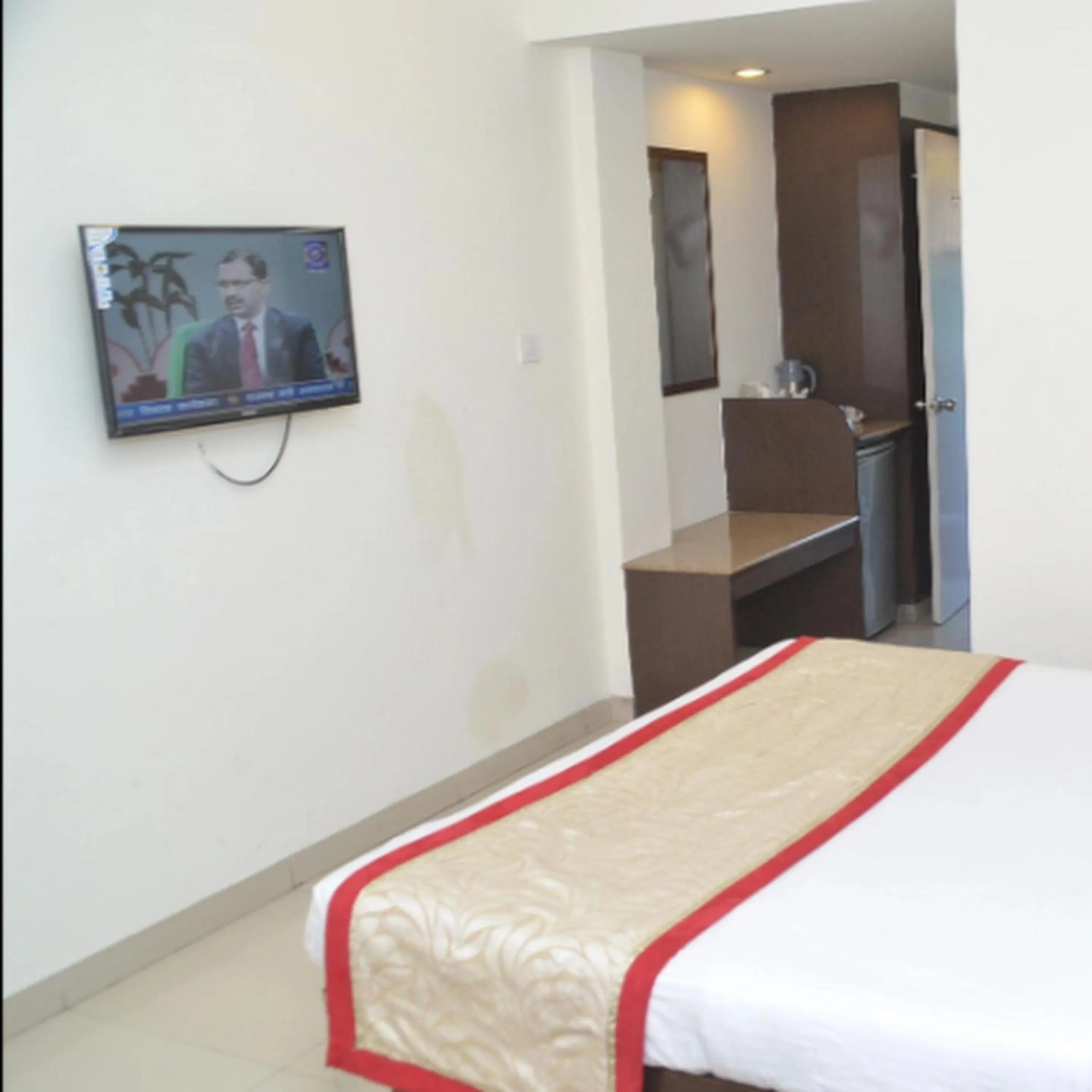 Photo of the whole room, Bed in Regency Square Hotel