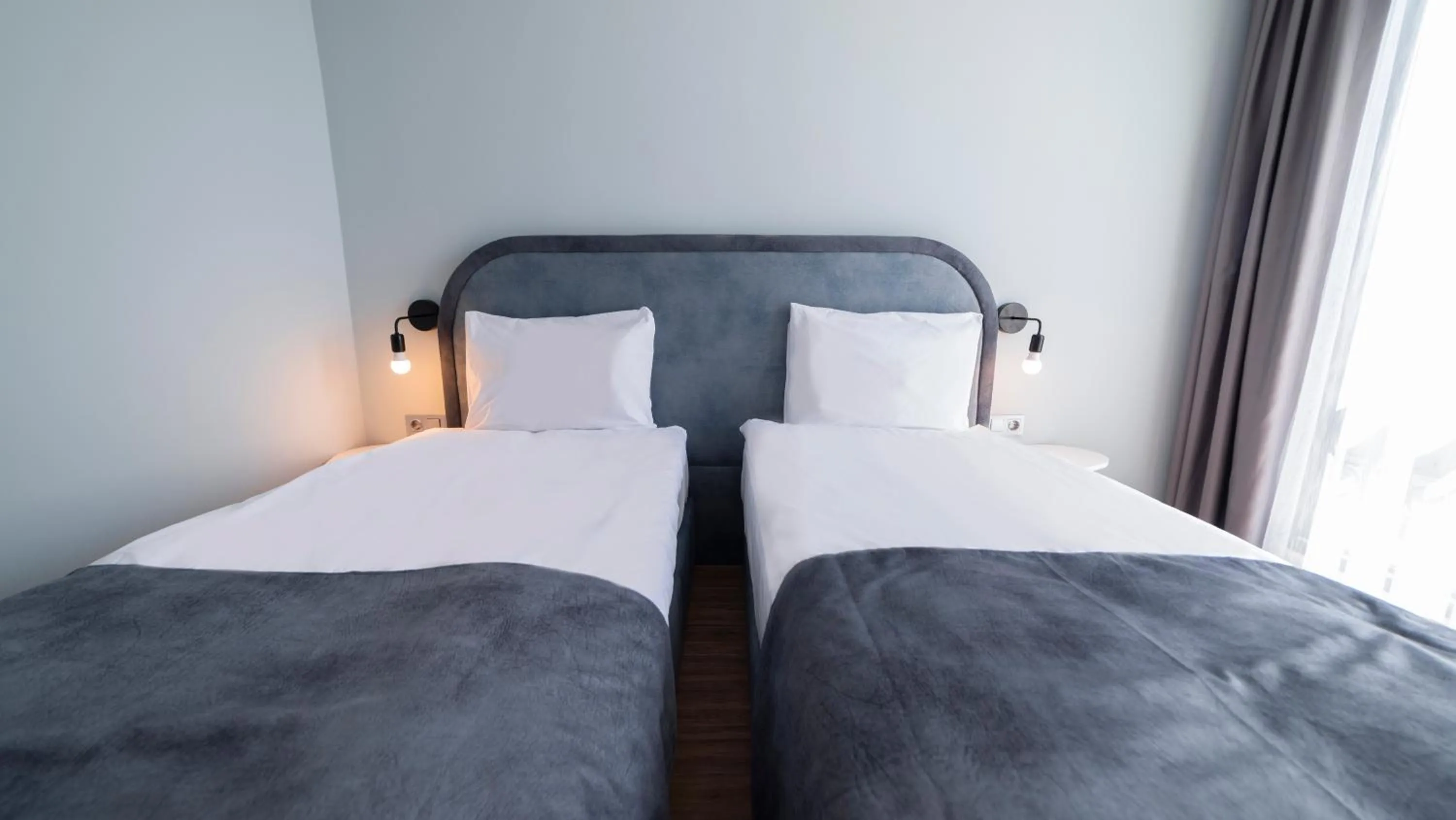 Staff, Bed in The Mori Club Hotel