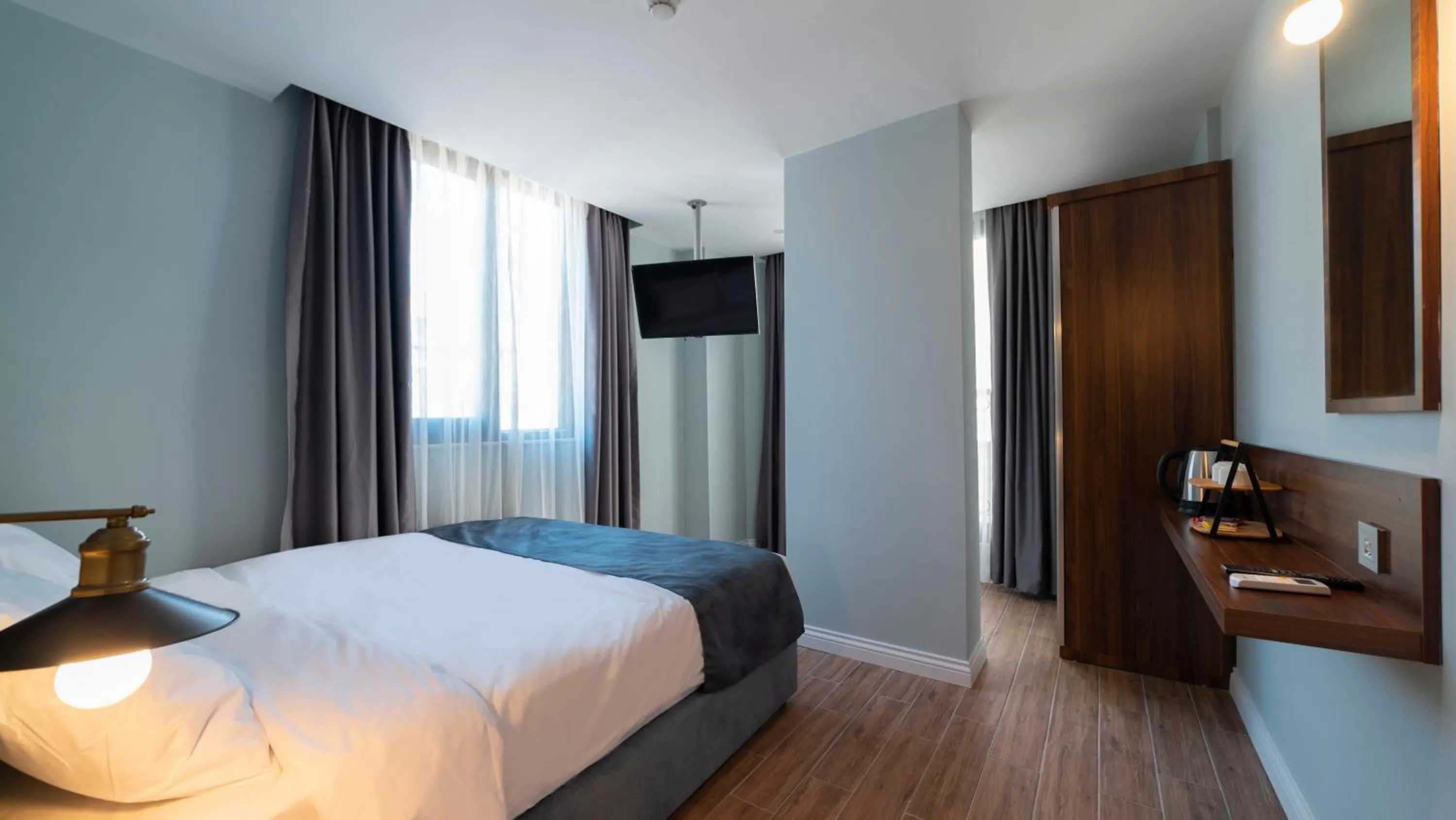 Staff, Bed in The Mori Club Hotel