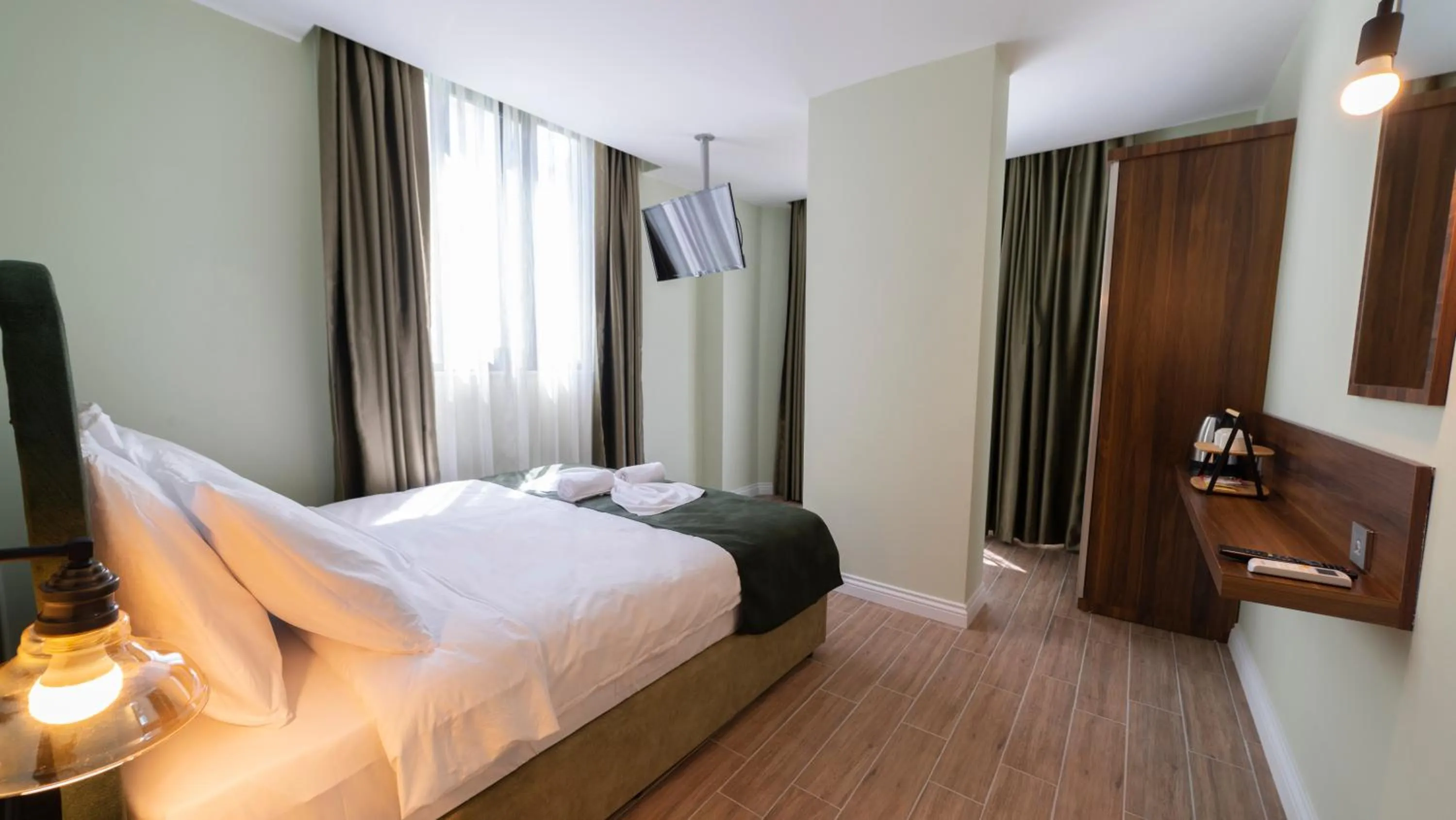 Staff, Bed in The Mori Club Hotel