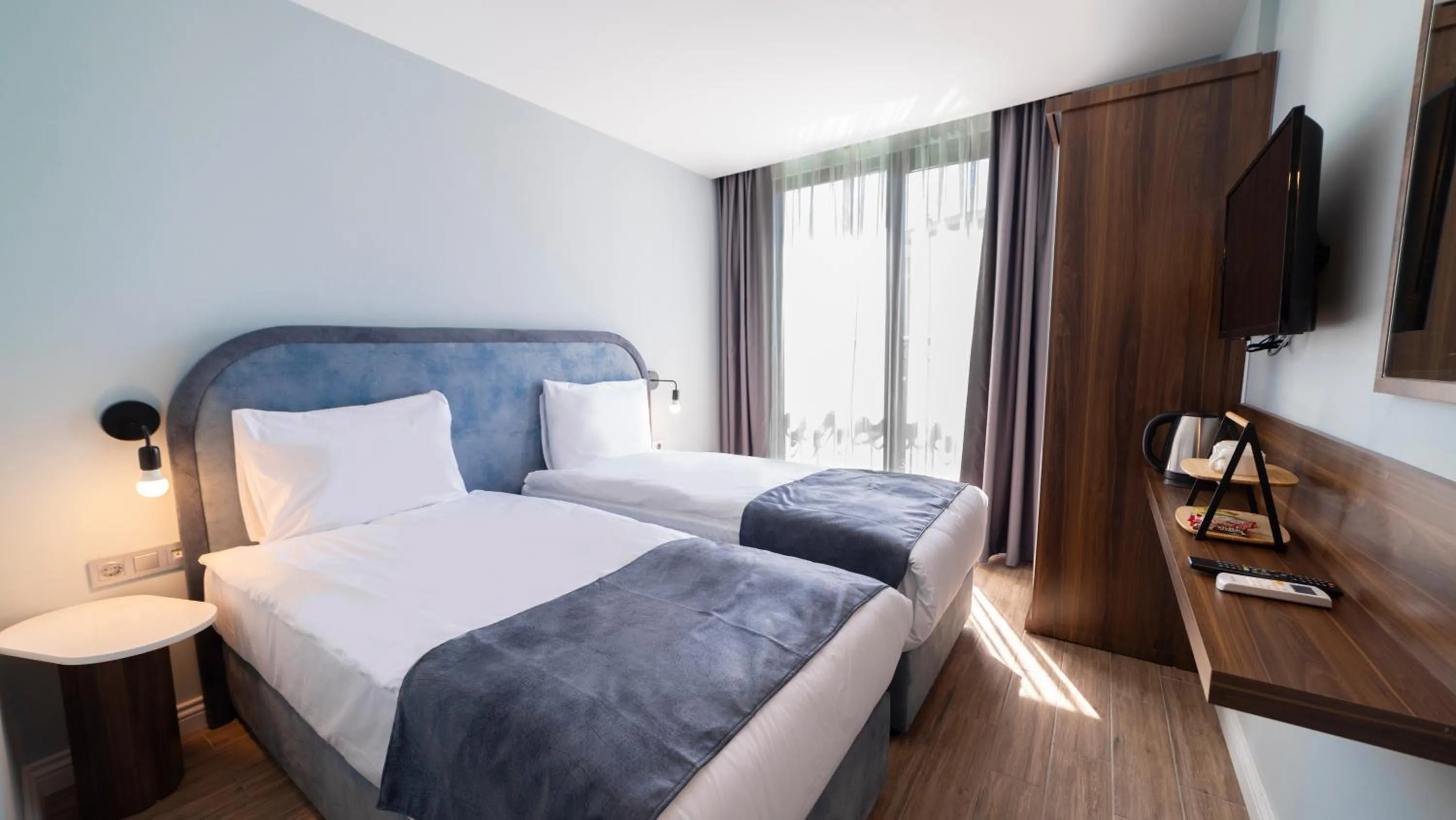 Staff, Bed in The Mori Club Hotel